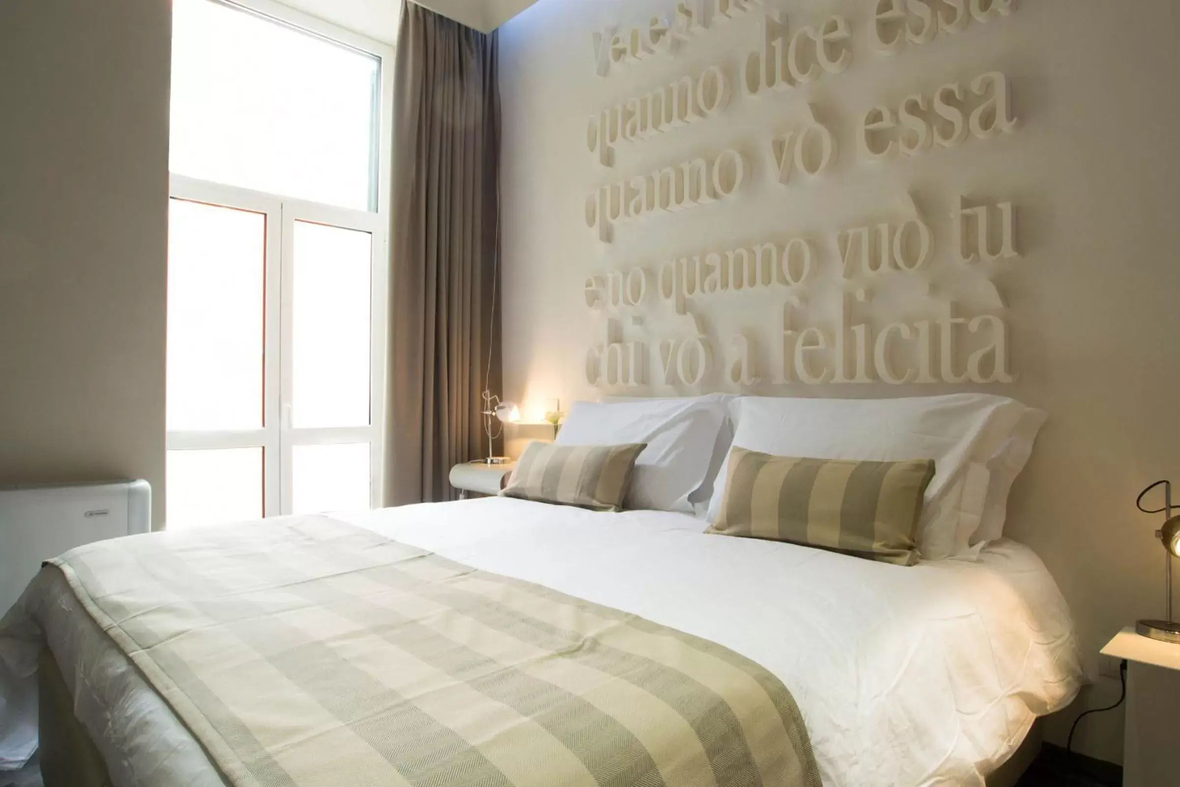 Bed in Hotel Santa Brigida