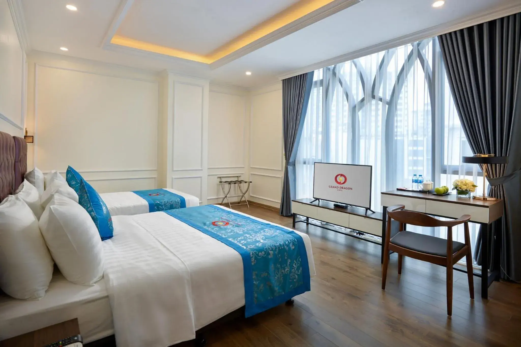 Bed in Grand Dragon Hotel Hanoi