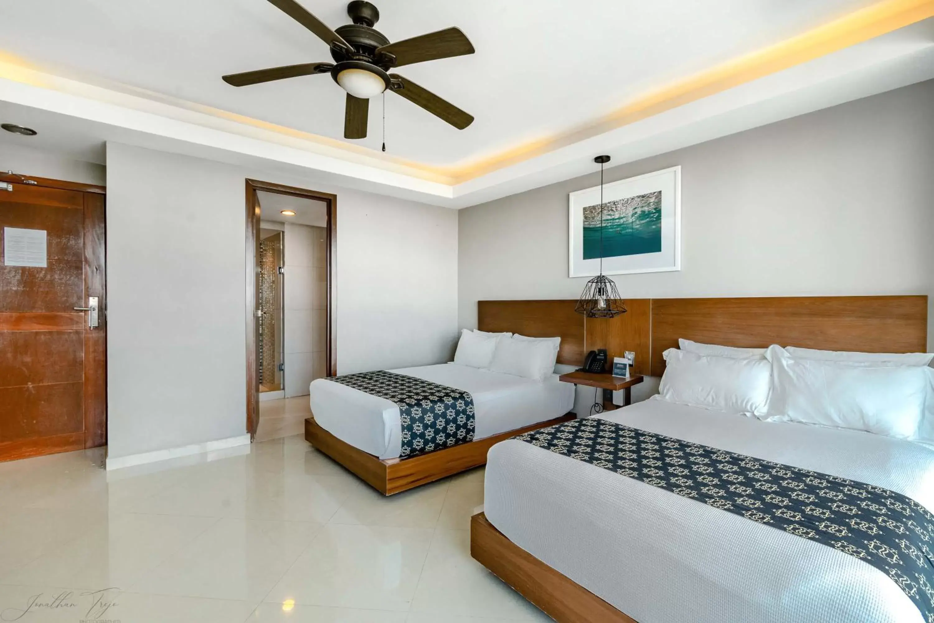 Bed in Ocean Dream Cancun by GuruHotel