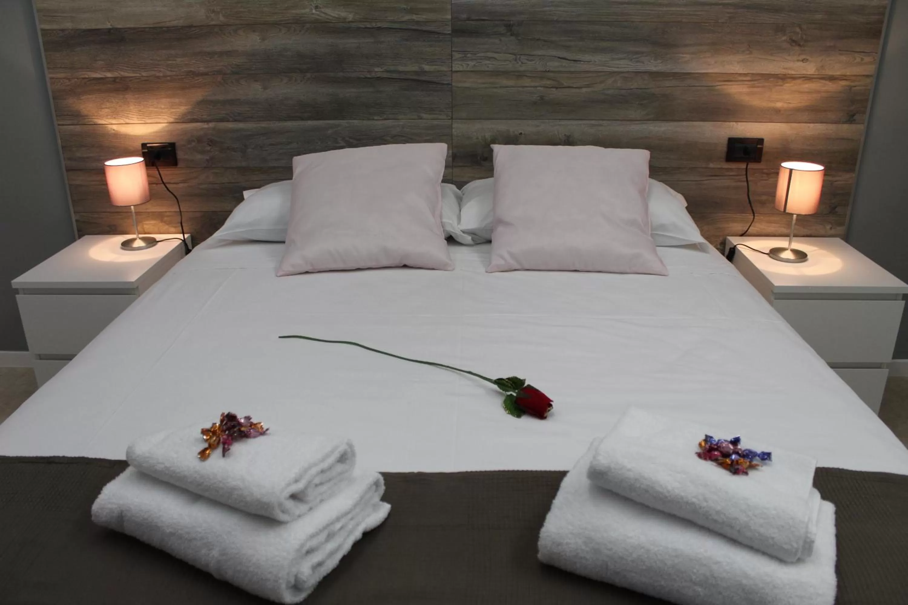 Bed in Royalty Rooms & Spa