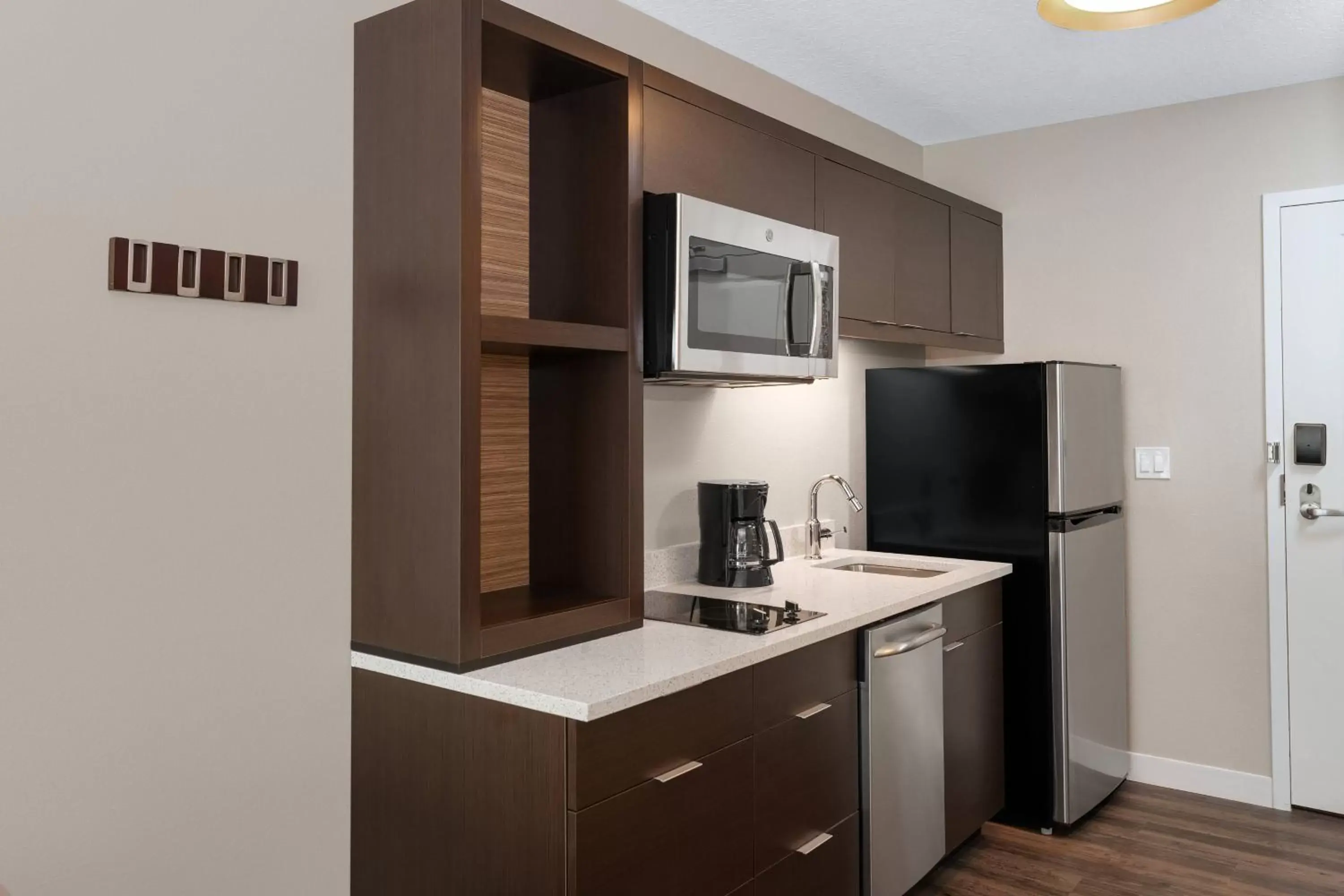 Kitchen or kitchenette, Kitchen/Kitchenette in TownePlace Suites by Marriott Titusville Kennedy Space Center