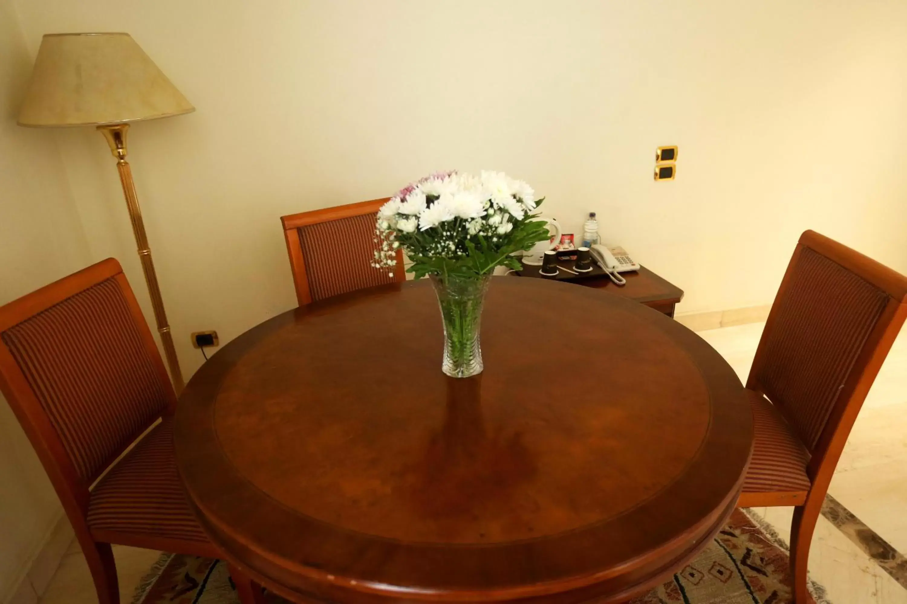 Photo of the whole room, Dining Area in Triumph Plaza Hotel