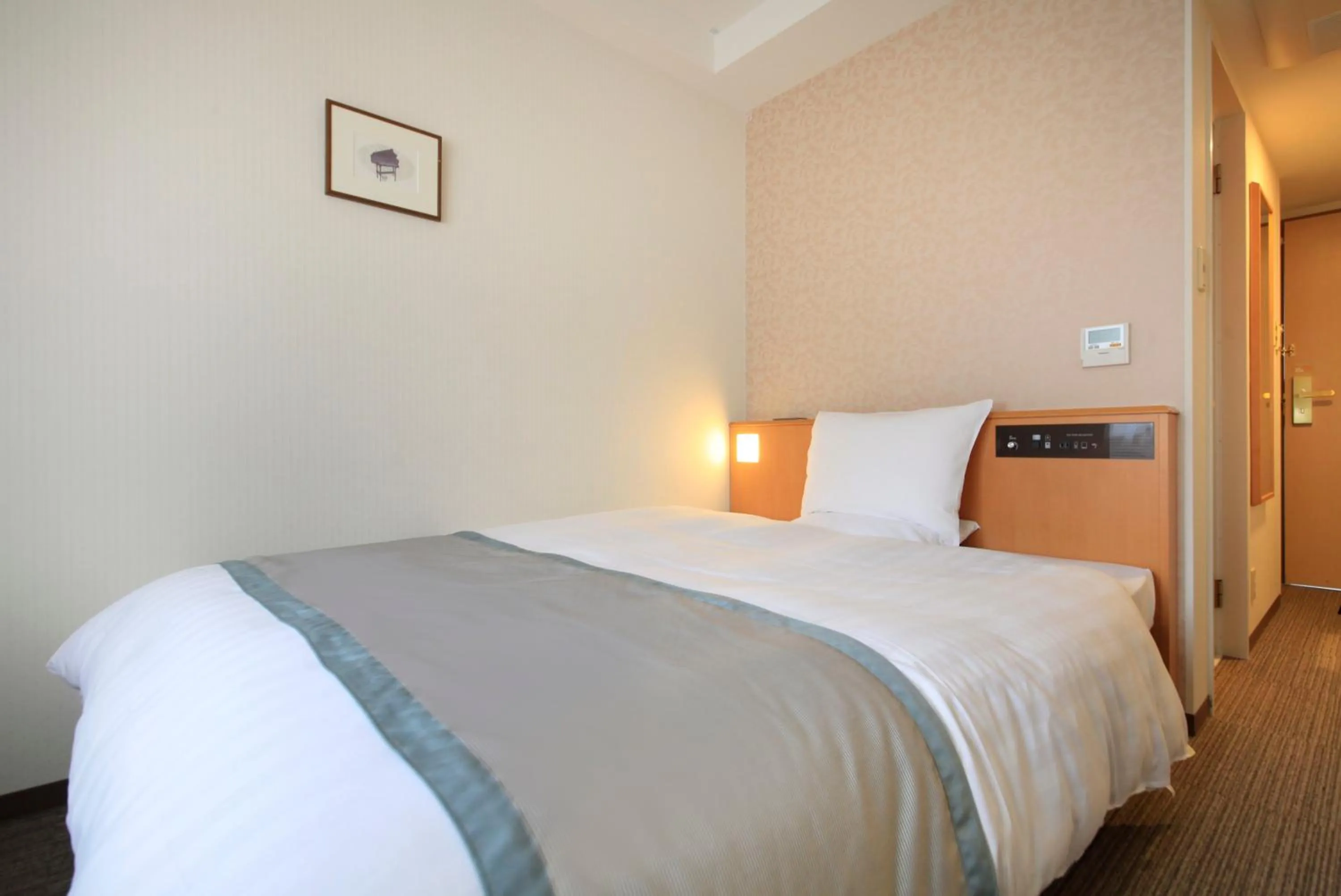 Photo of the whole room, Bed in Richmond Hotel Sapporo Ekimae