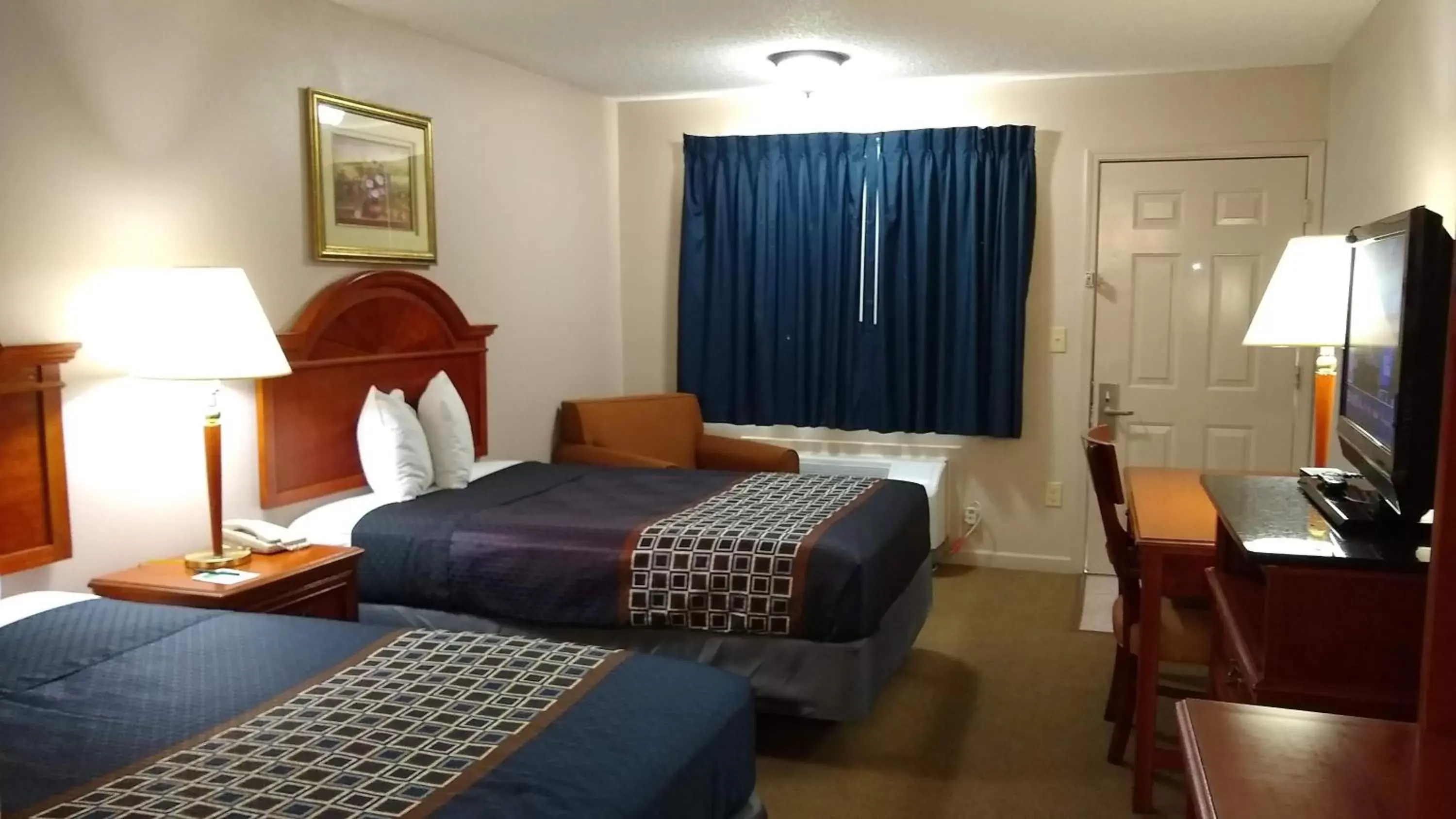 Bedroom, Bed in Carom Inn a Travelodge by Wyndham Denham Springs-Baton Rouge