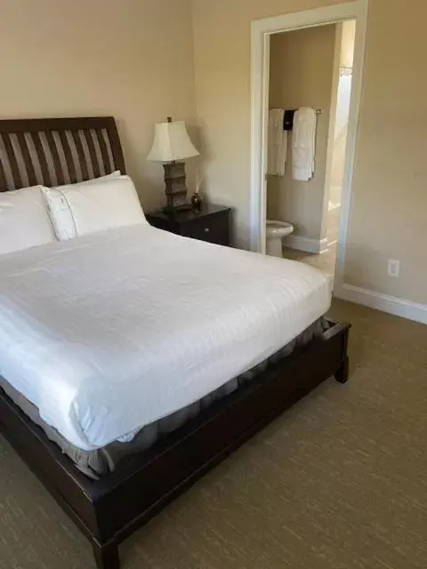 Bed in Cottages and Suites at River Landing