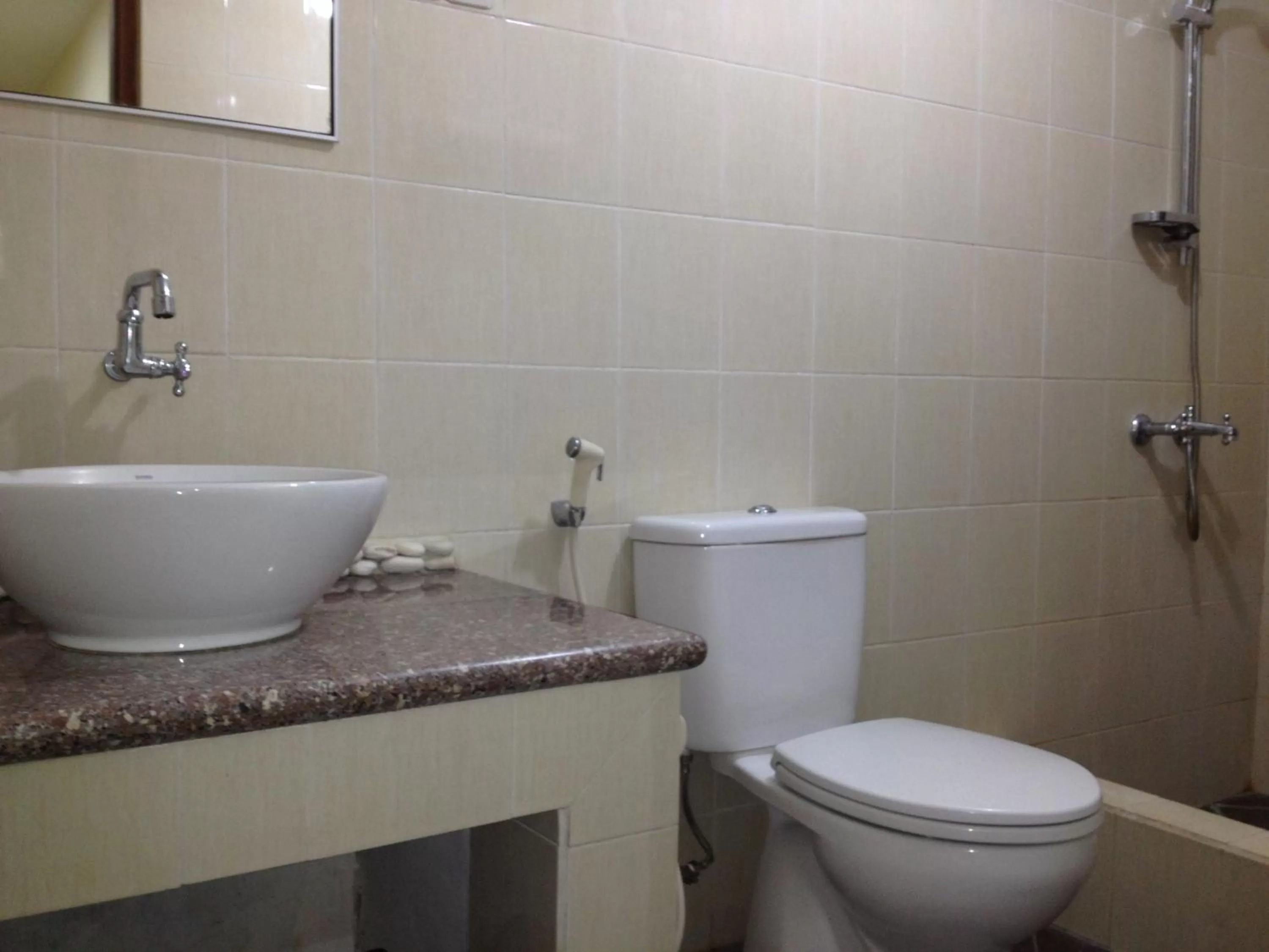 Bathroom in Astina Hotel