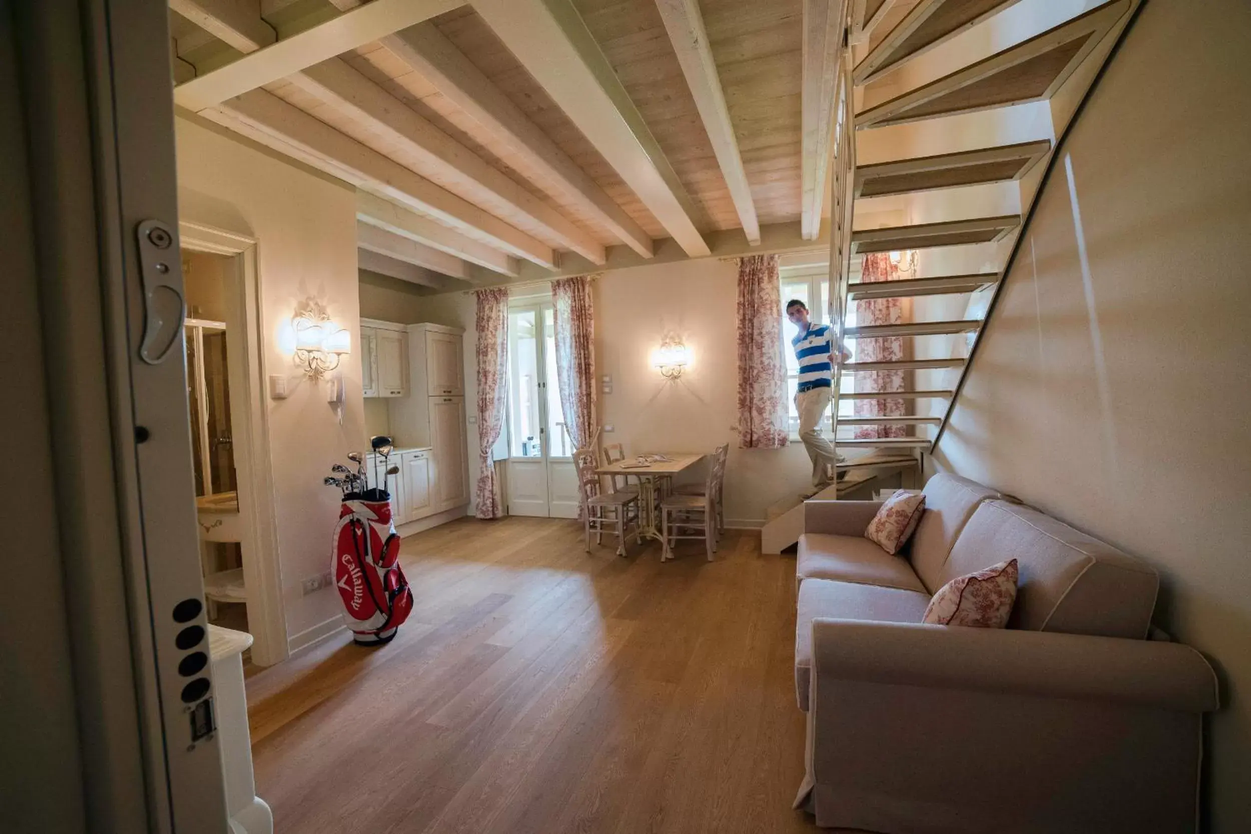 Living room, Seating Area in Chervò Golf Apartments Garda Lake