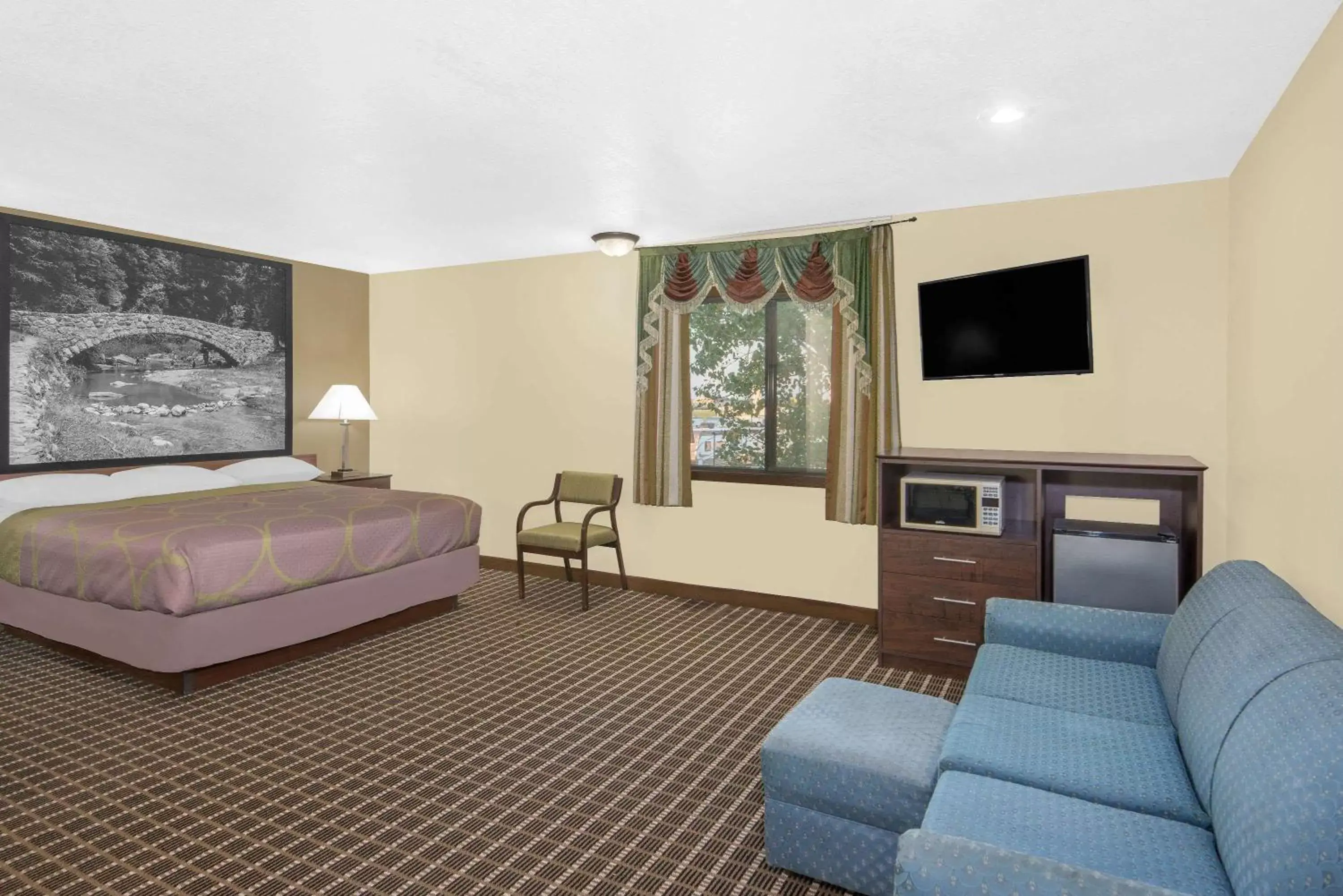 Photo of the whole room, TV/Entertainment Center in Super 8 by Wyndham Webster City IA