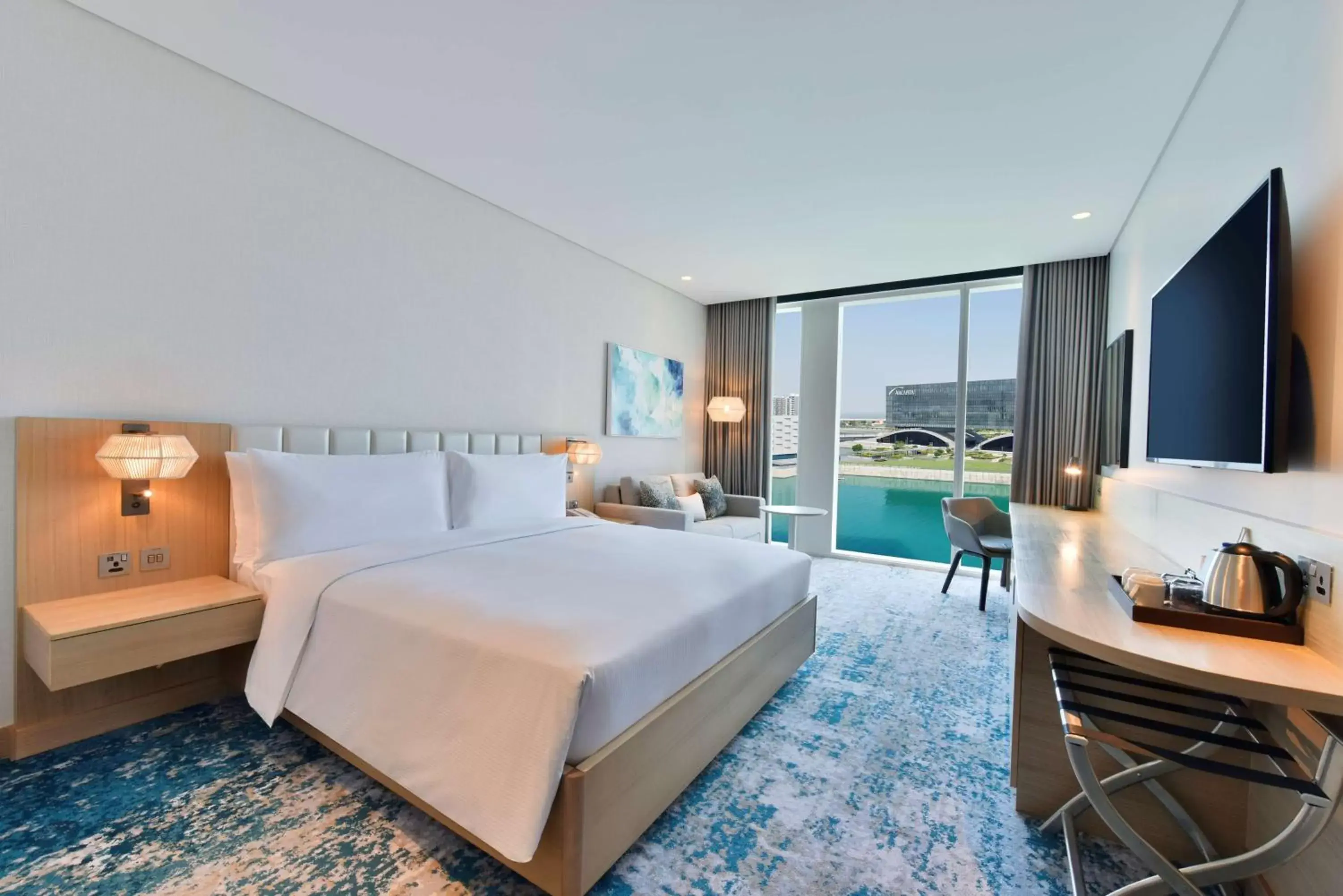 Living room, Bed in Hilton Garden Inn Bahrain Bay