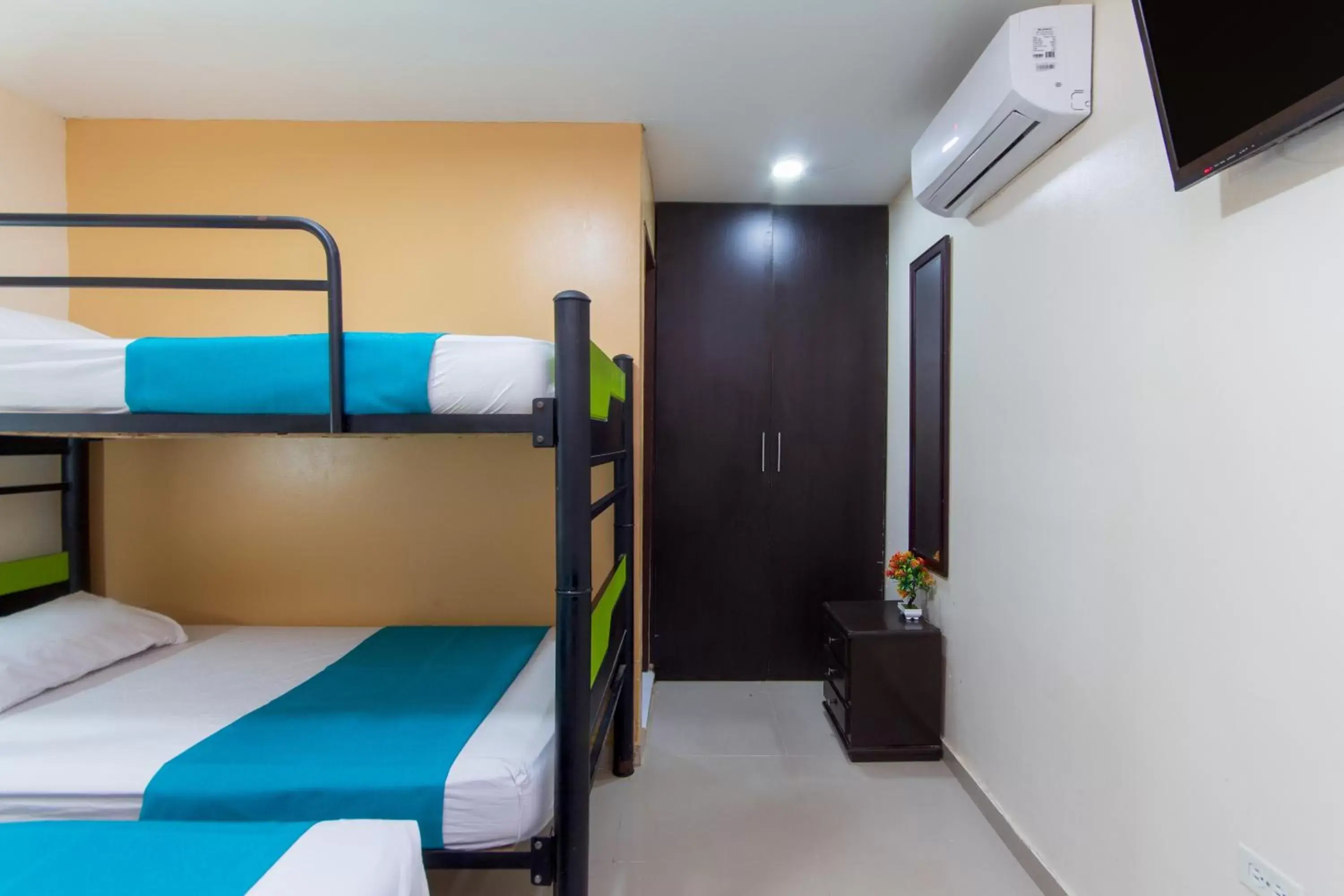Bedroom, Bunk Bed in Azuán Suites Hotel By GEH Suites