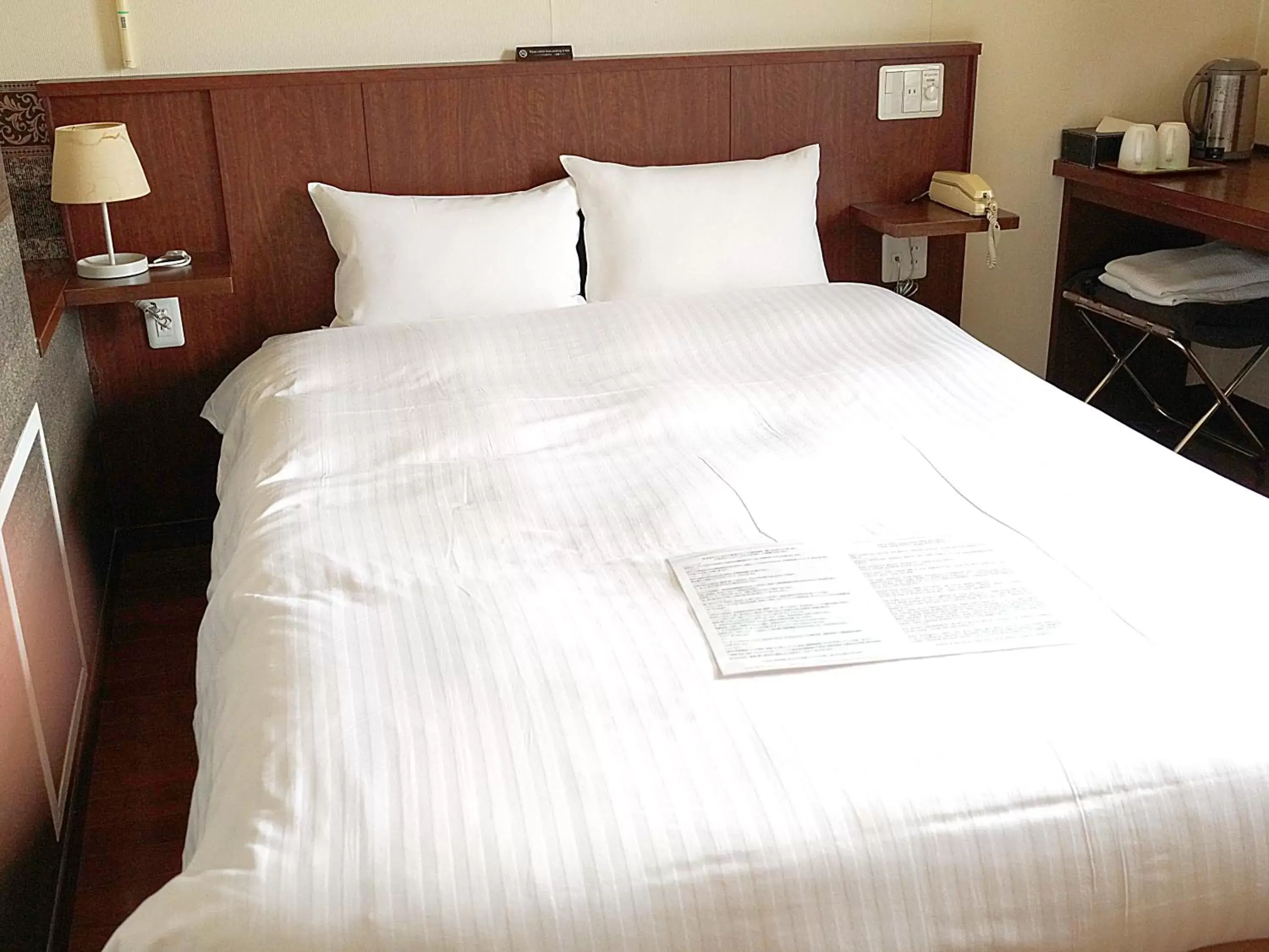 Bed in Sutton Hotel Hakata City