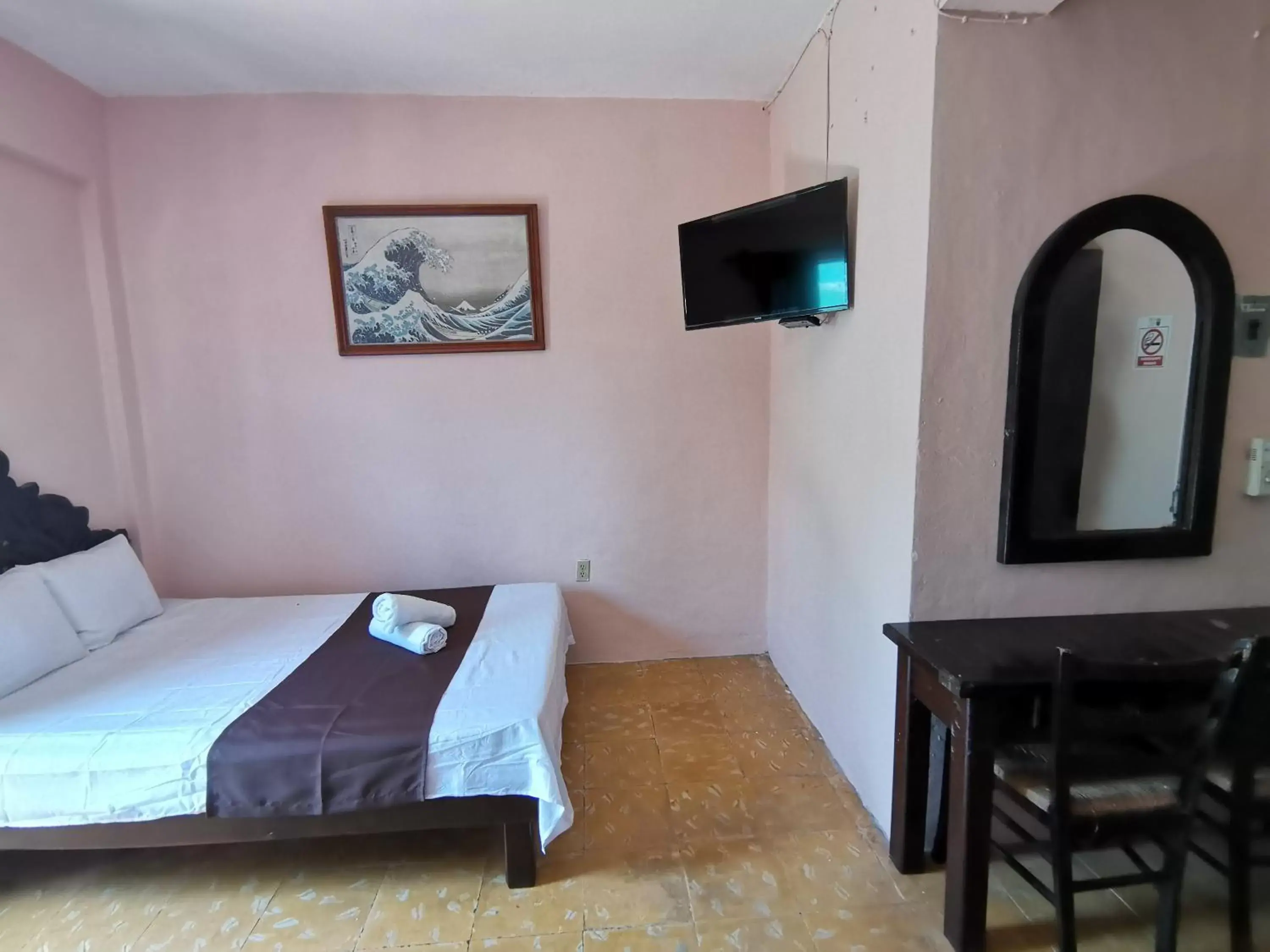 Bed in Hotel Colonial San Carlos
