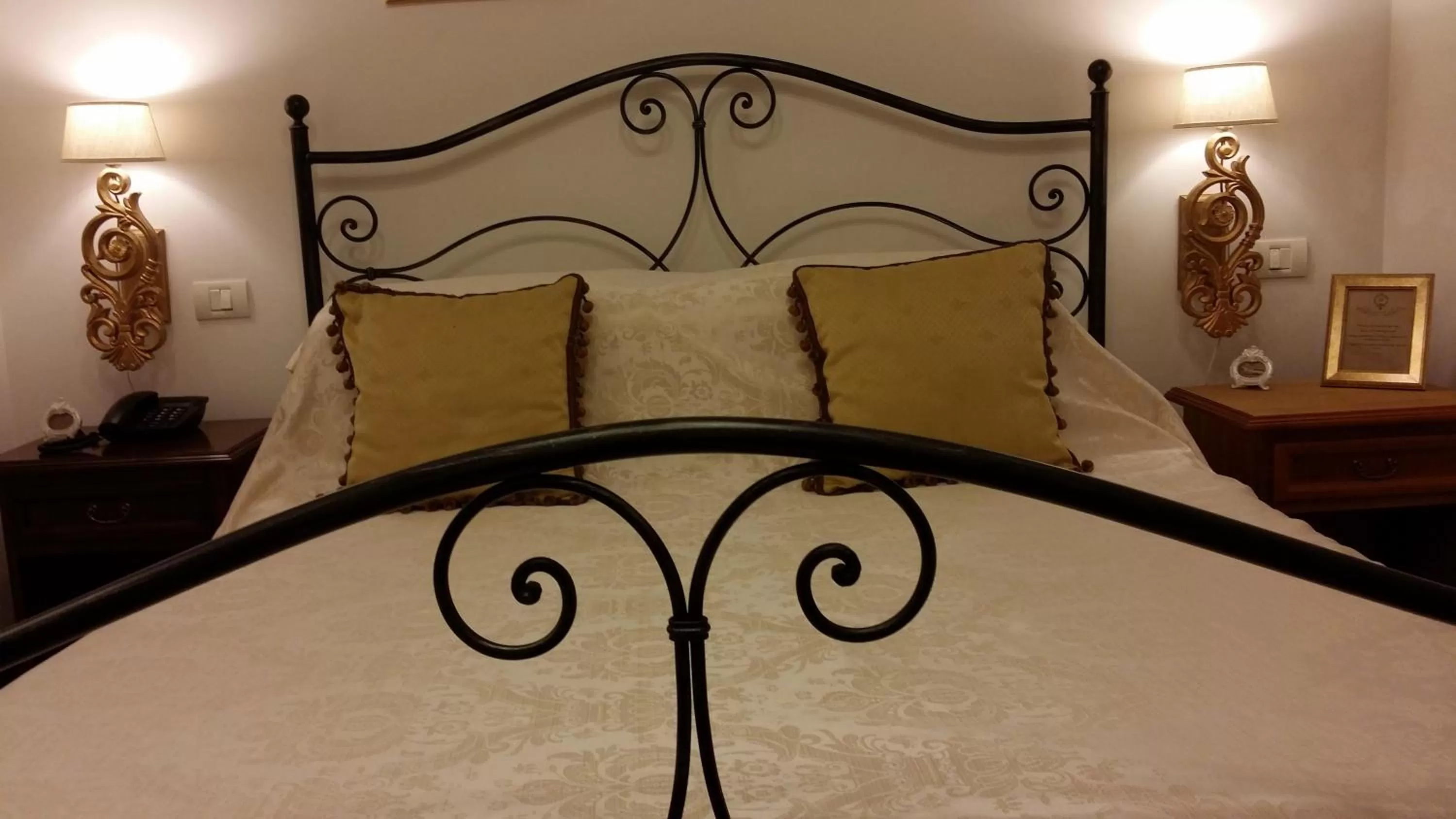 Bed in Grand Boutique Hotel