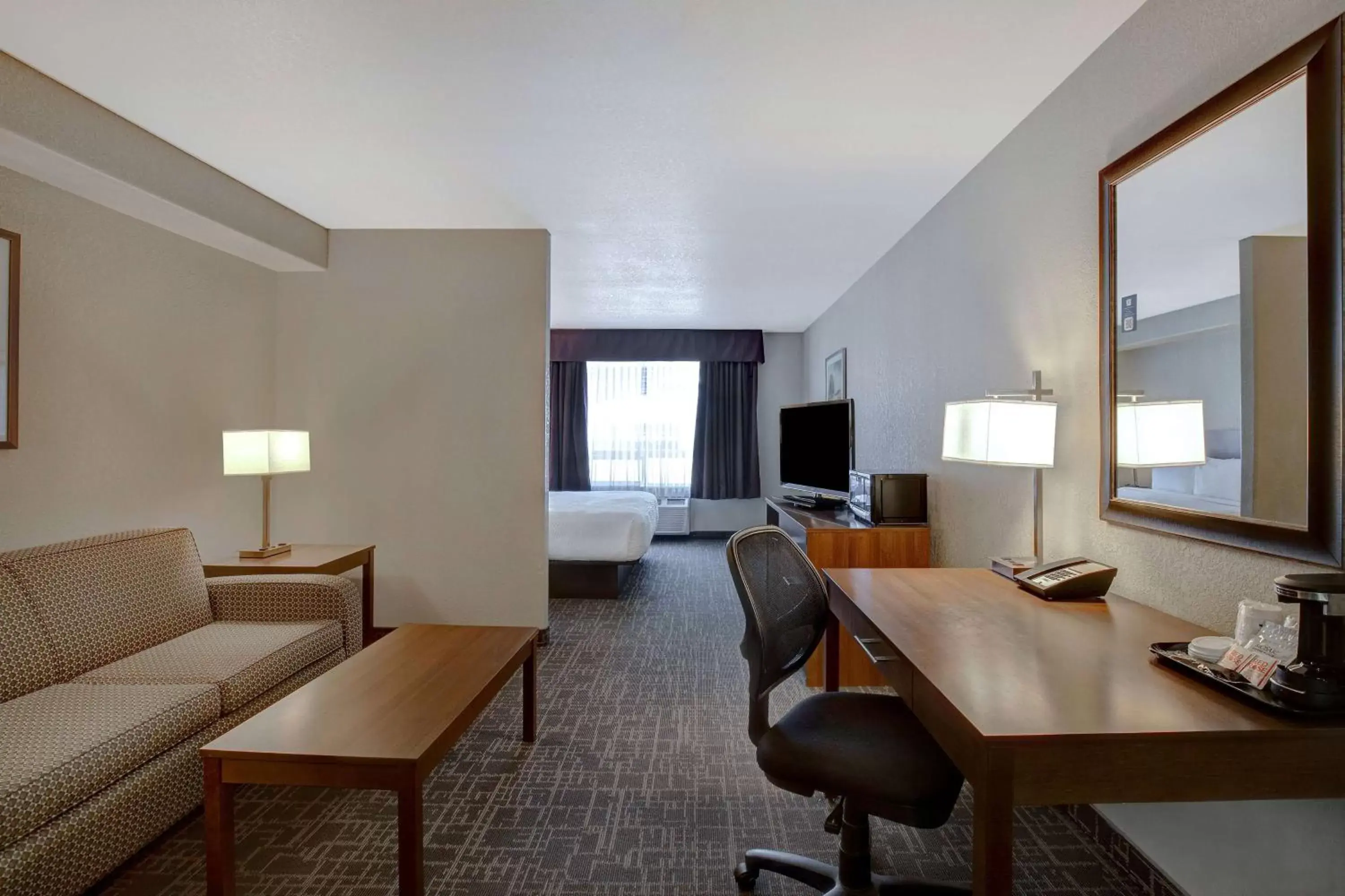 Bed, Seating Area in Days Inn & Suites by Wyndham Yorkton