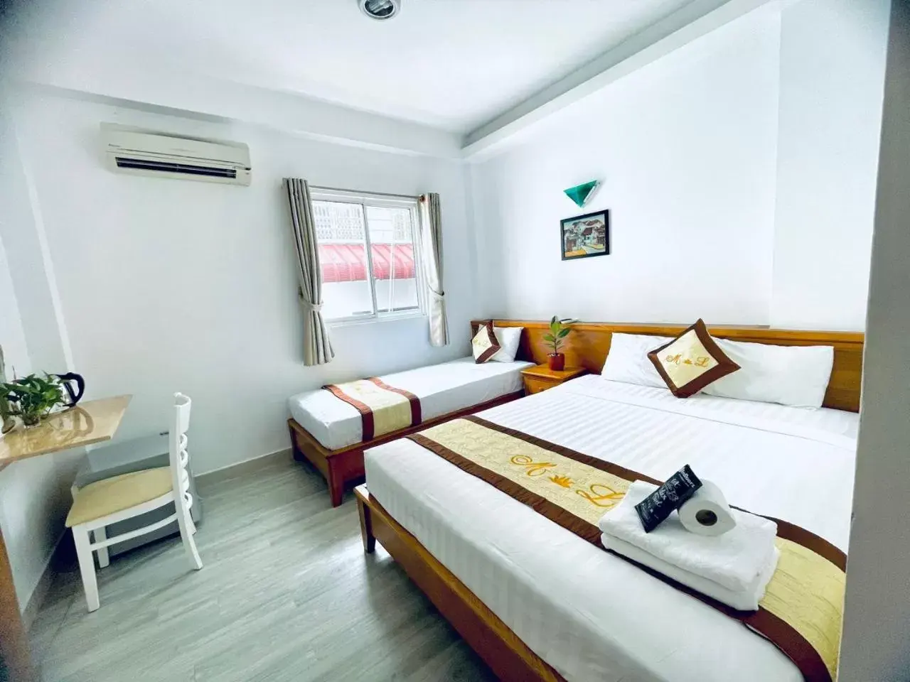 Deluxe Triple Room in Marieline Hotel Pham Ngu Lao Deluxe Triple Room in Marieline Hotel Pham Ngu Lao