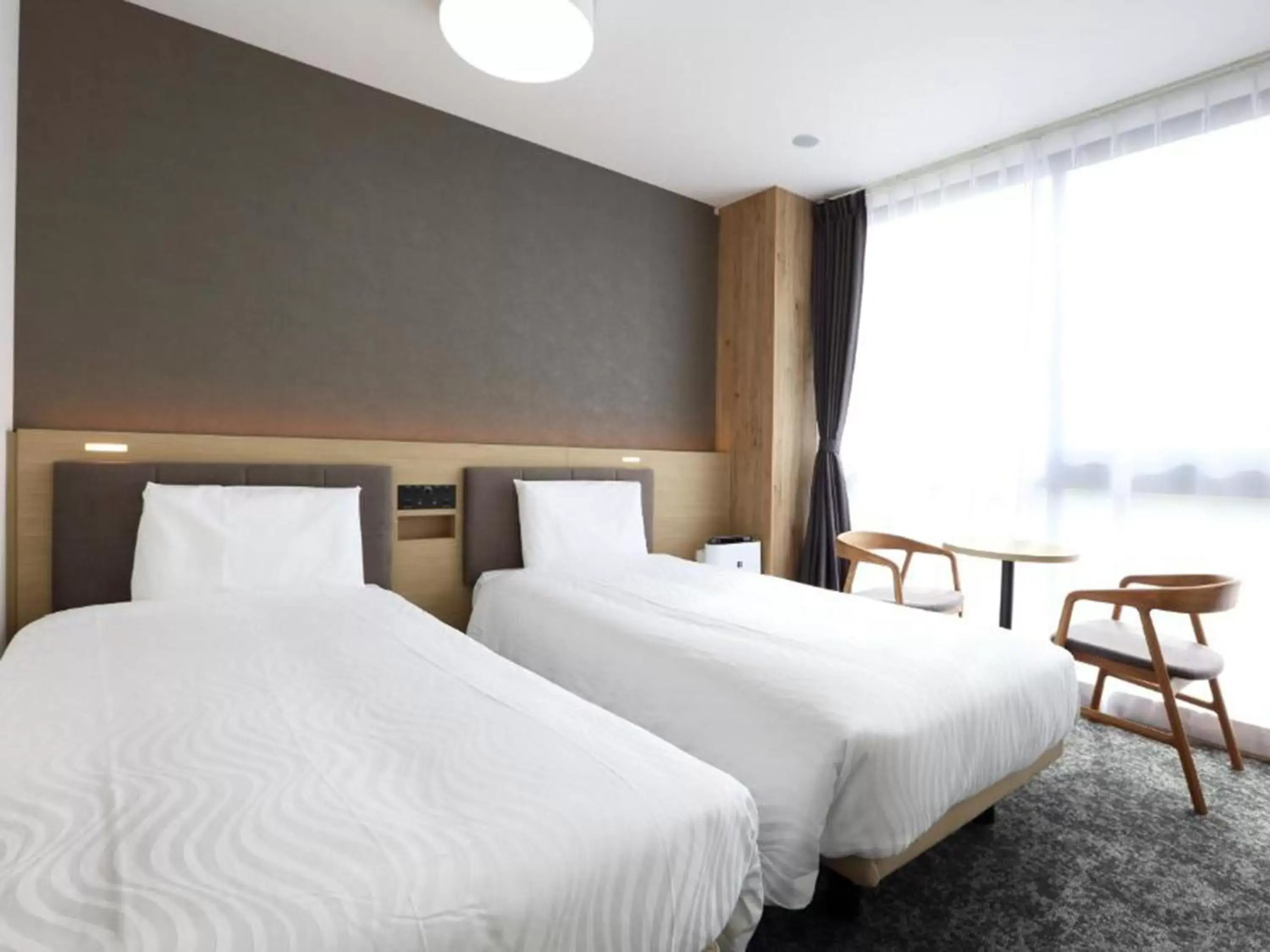 Bed in Henn na Hotel Kansai Airport