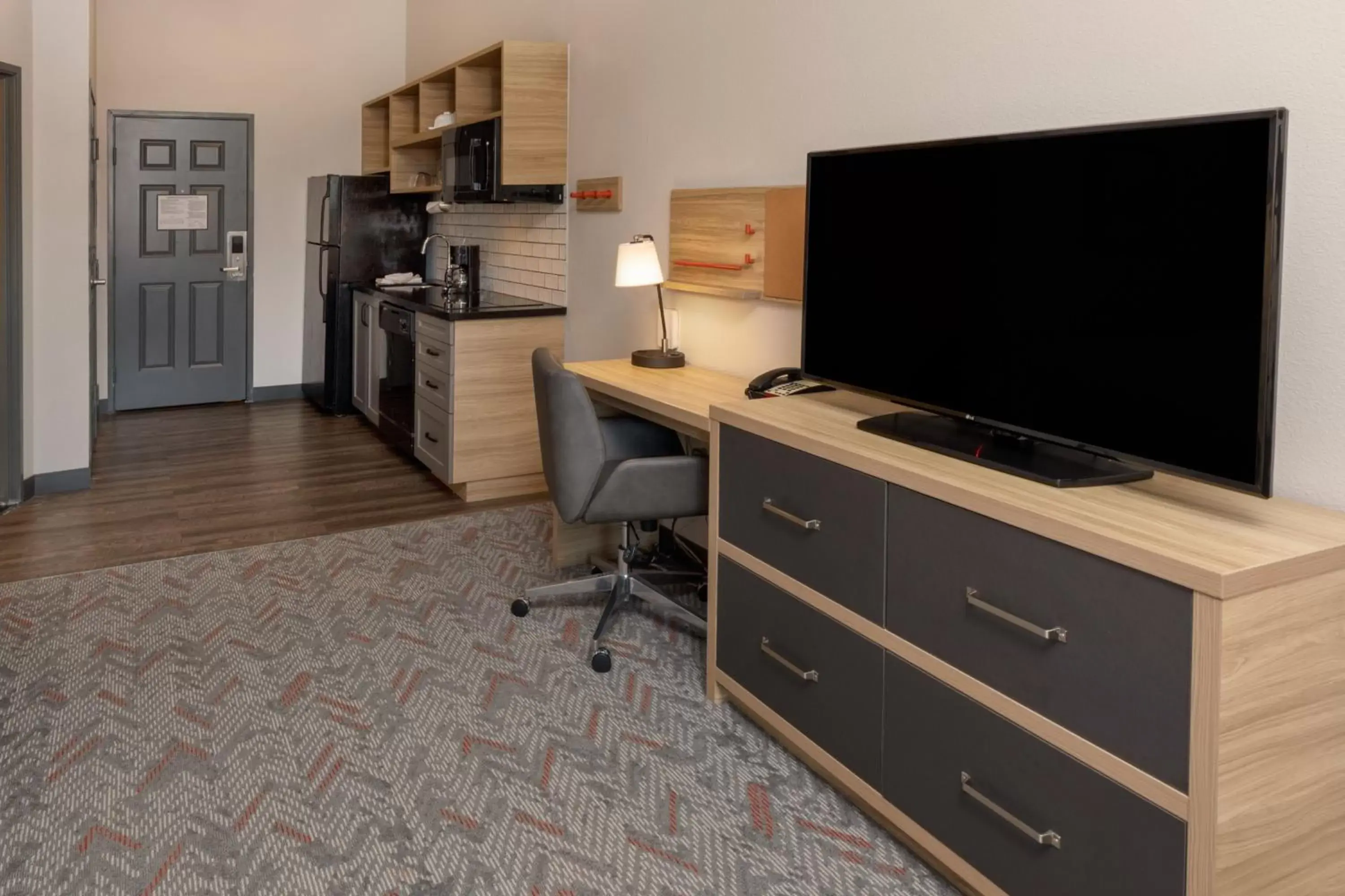 Photo of the whole room, TV/Entertainment Center in Candlewood Suites Mount Pleasant, an IHG Hotel