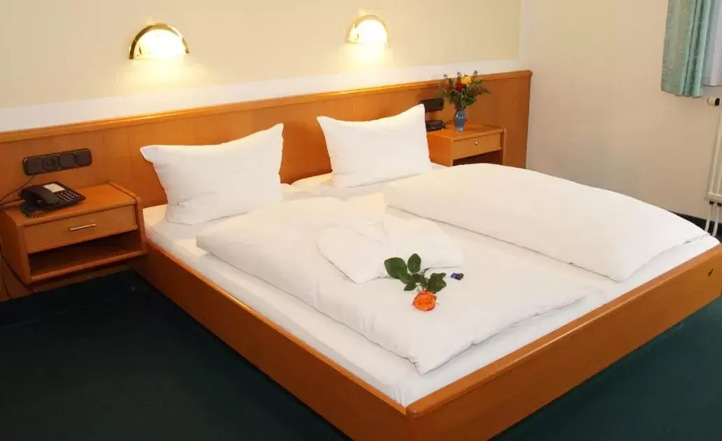 Bed in Hotel Lengenfelder Hof