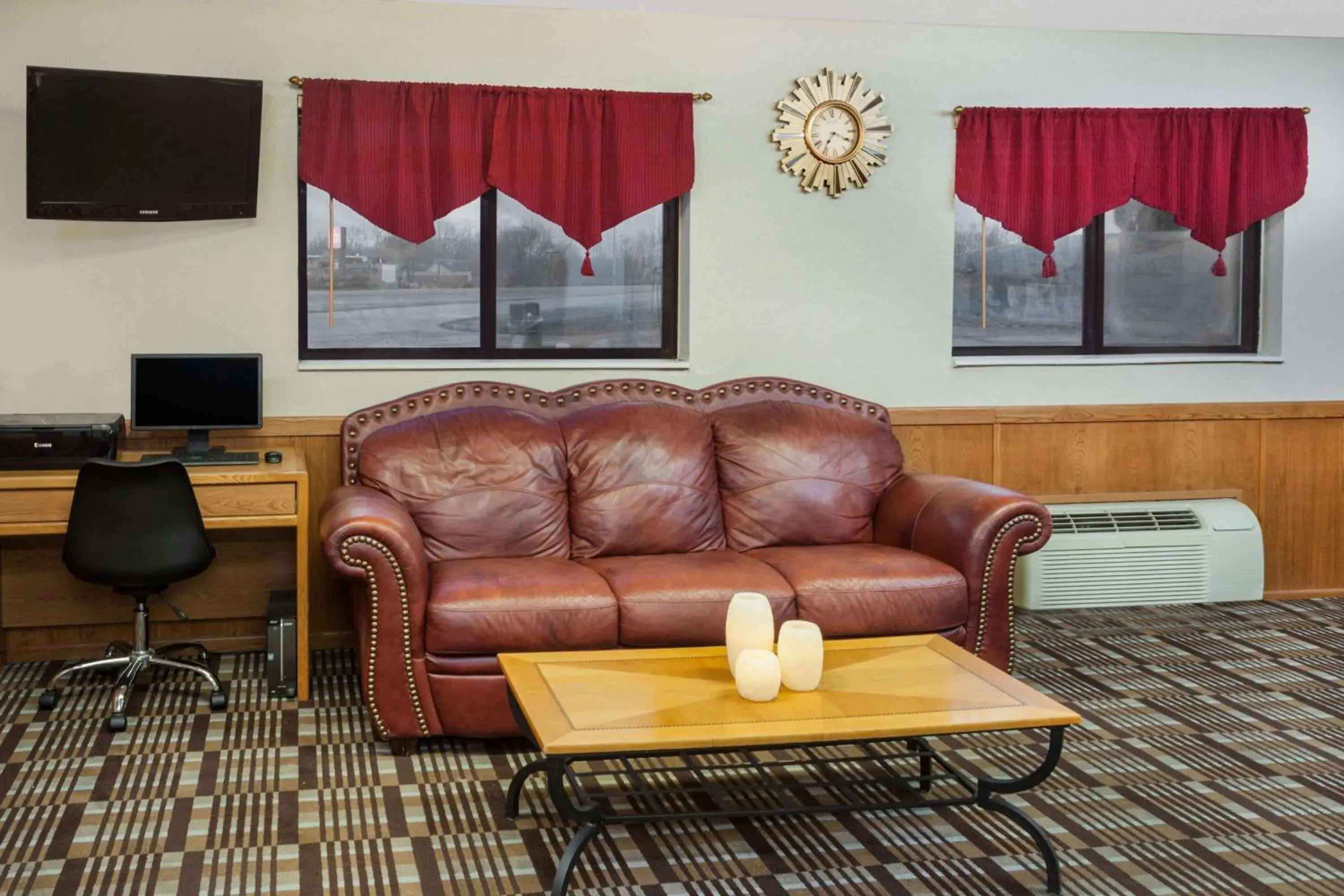 Lobby or reception in Super 8 by Wyndham Muscatine Lobby or reception in Super 8 by Wyndham Muscatine