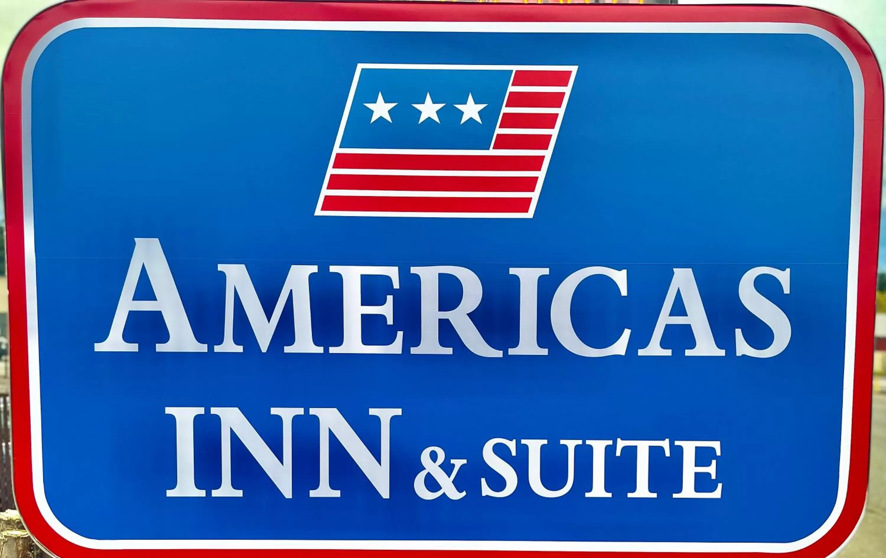 Property logo or sign in Americas Inn & Suite