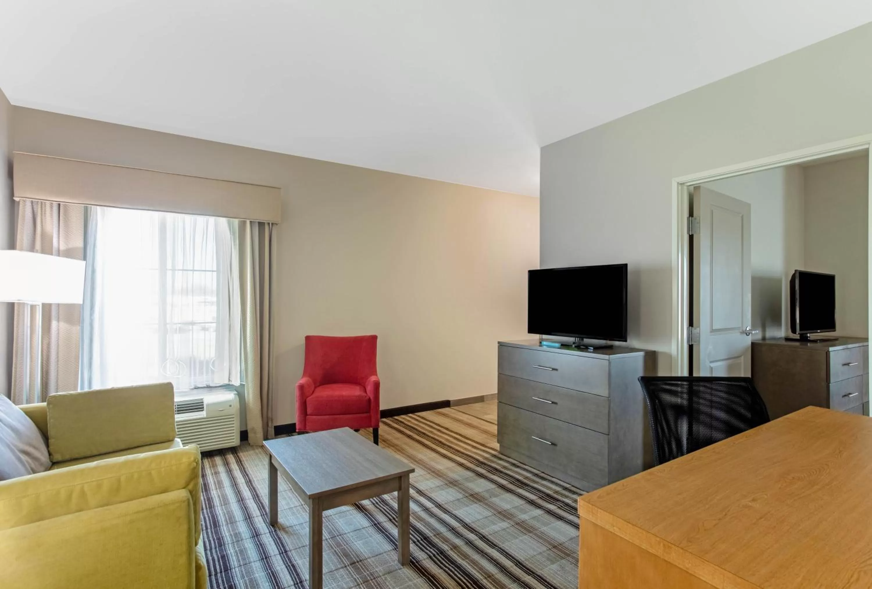 Communal lounge/ TV room in La Quinta by Wyndham Paducah