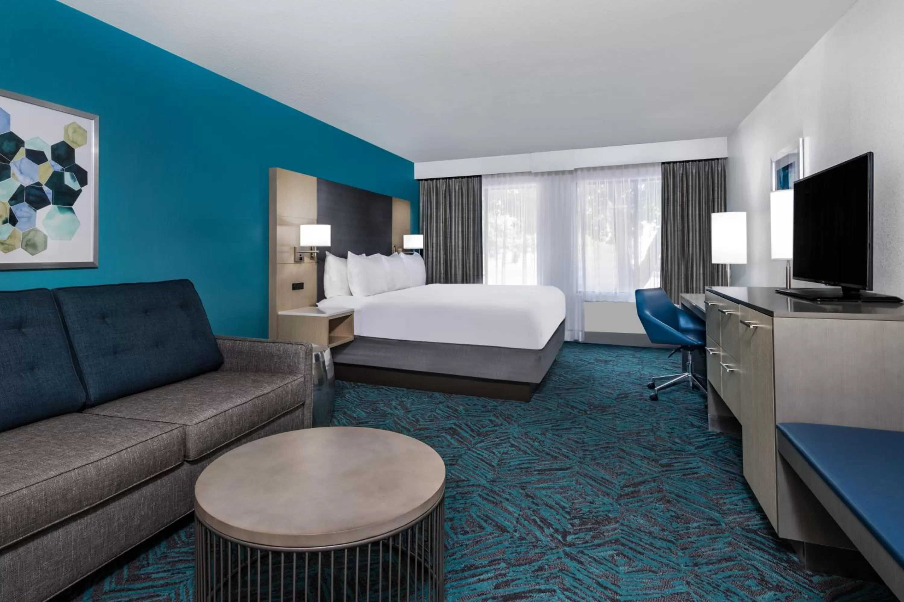 Photo of the whole room, Bed in Radisson Hotel Colorado Springs Airport
