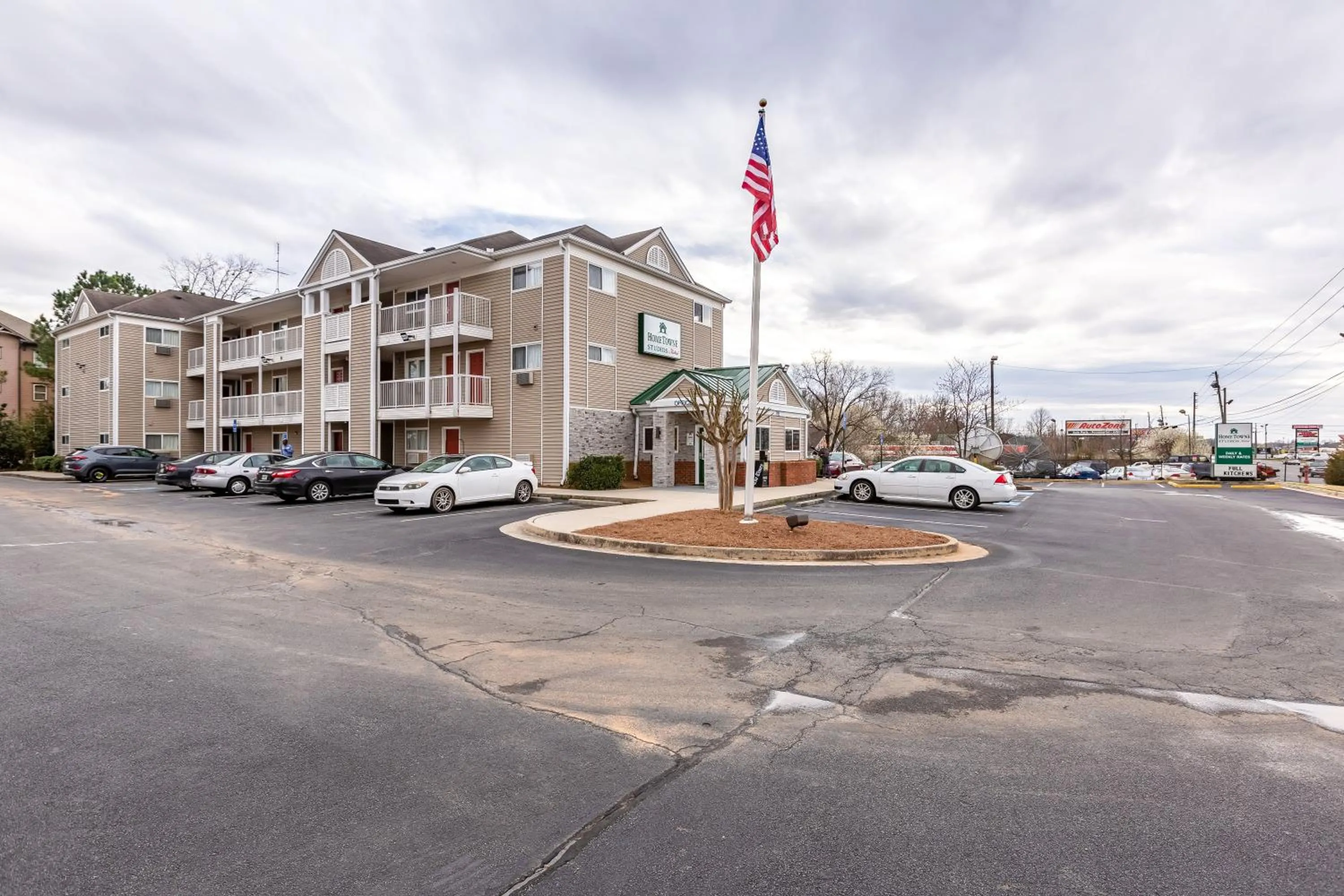 Property building in HomeTowne Studios by Red Roof Gainesville, GA
