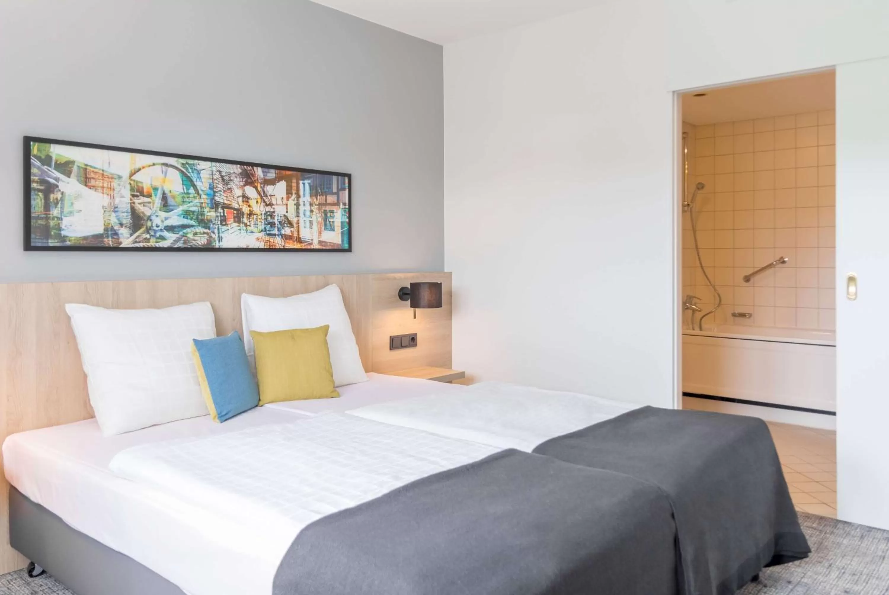 Photo of the whole room, Bed in Ramada by Wyndham Flensburg City