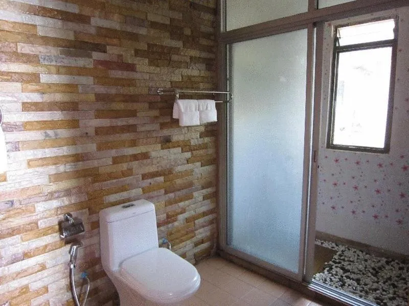 Toilet in Lanta Paradise Beach Resort