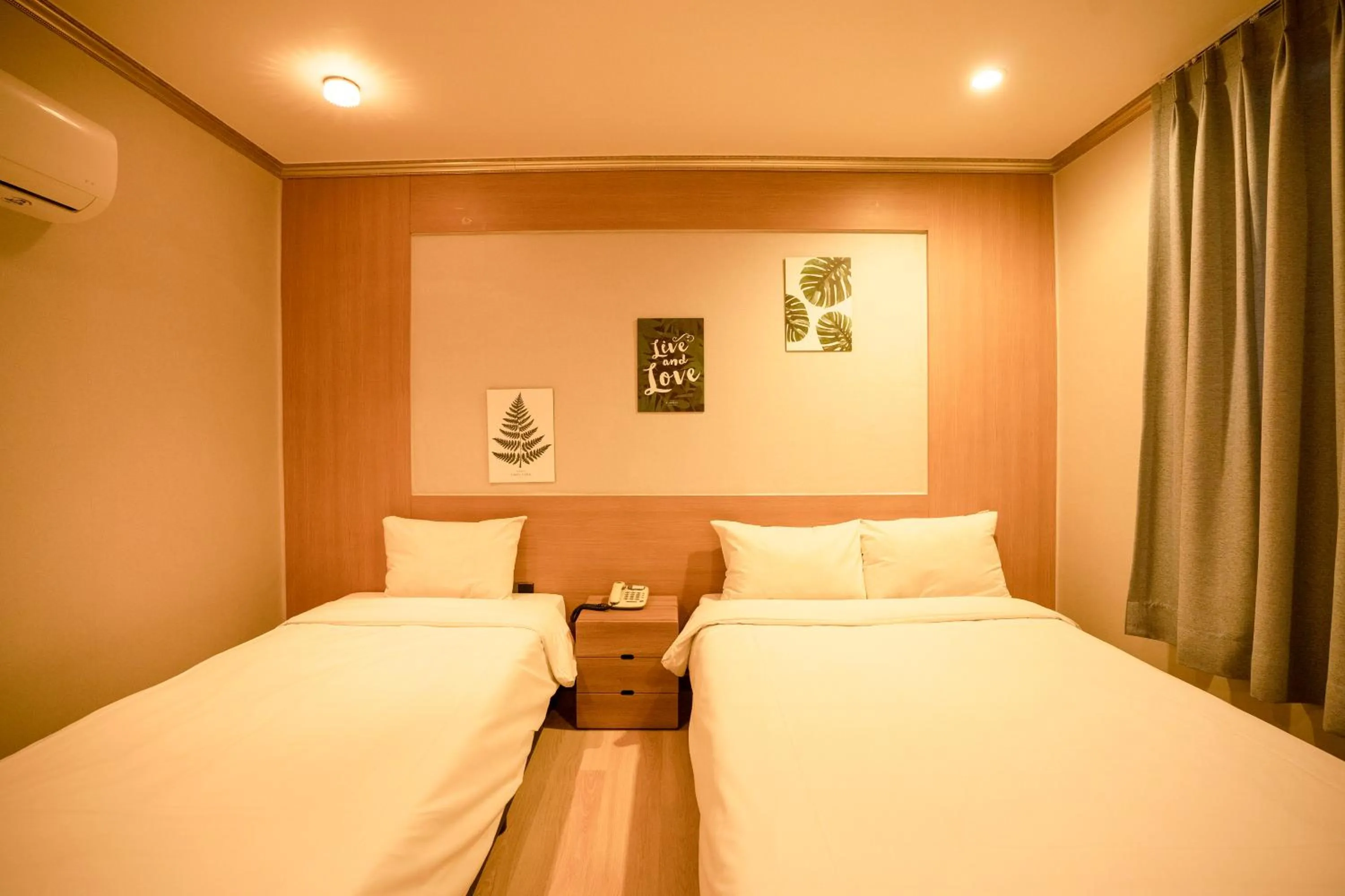 Bed in Jeju Stay Hotel