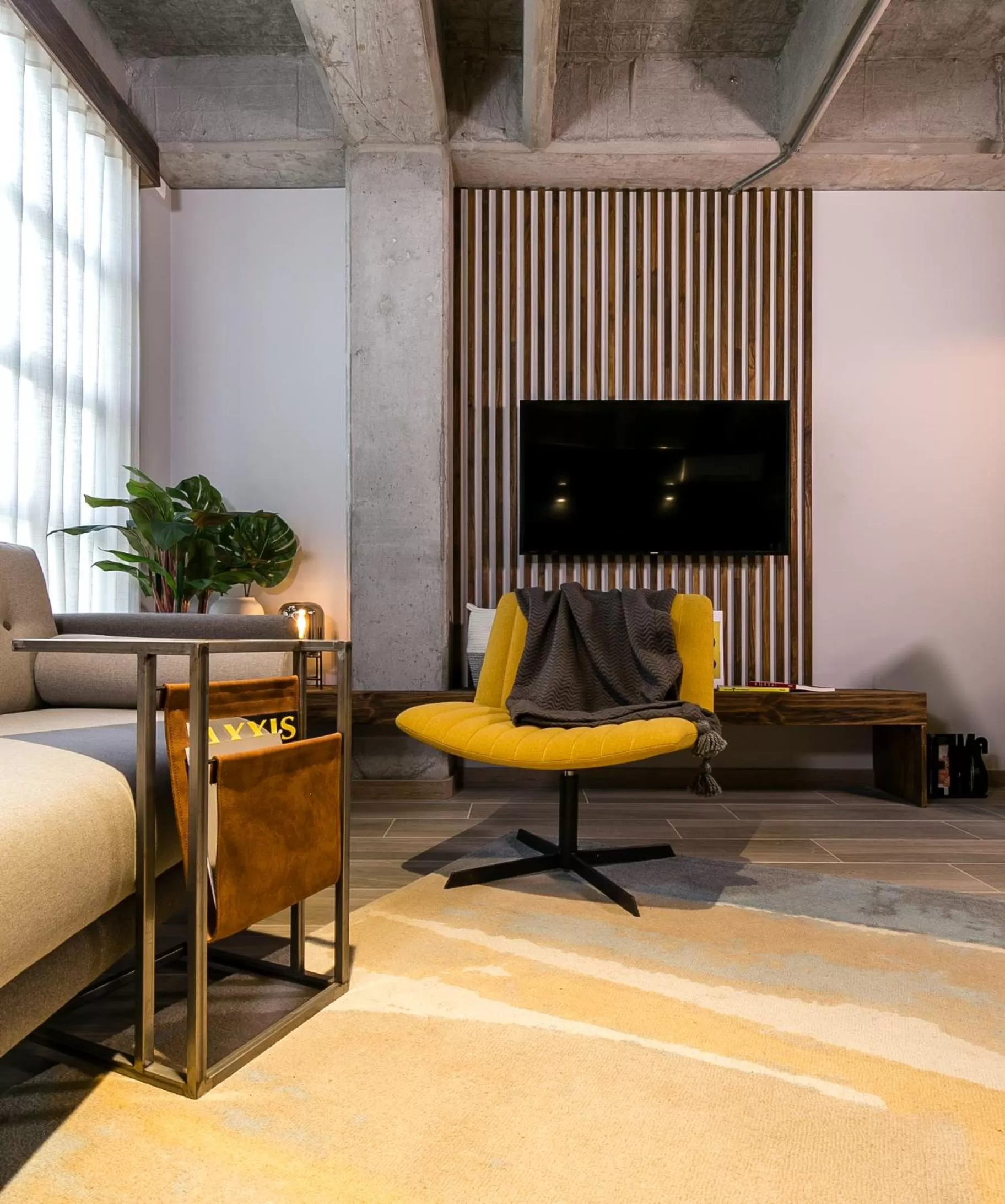 Bed in Factory Lofts Hotel