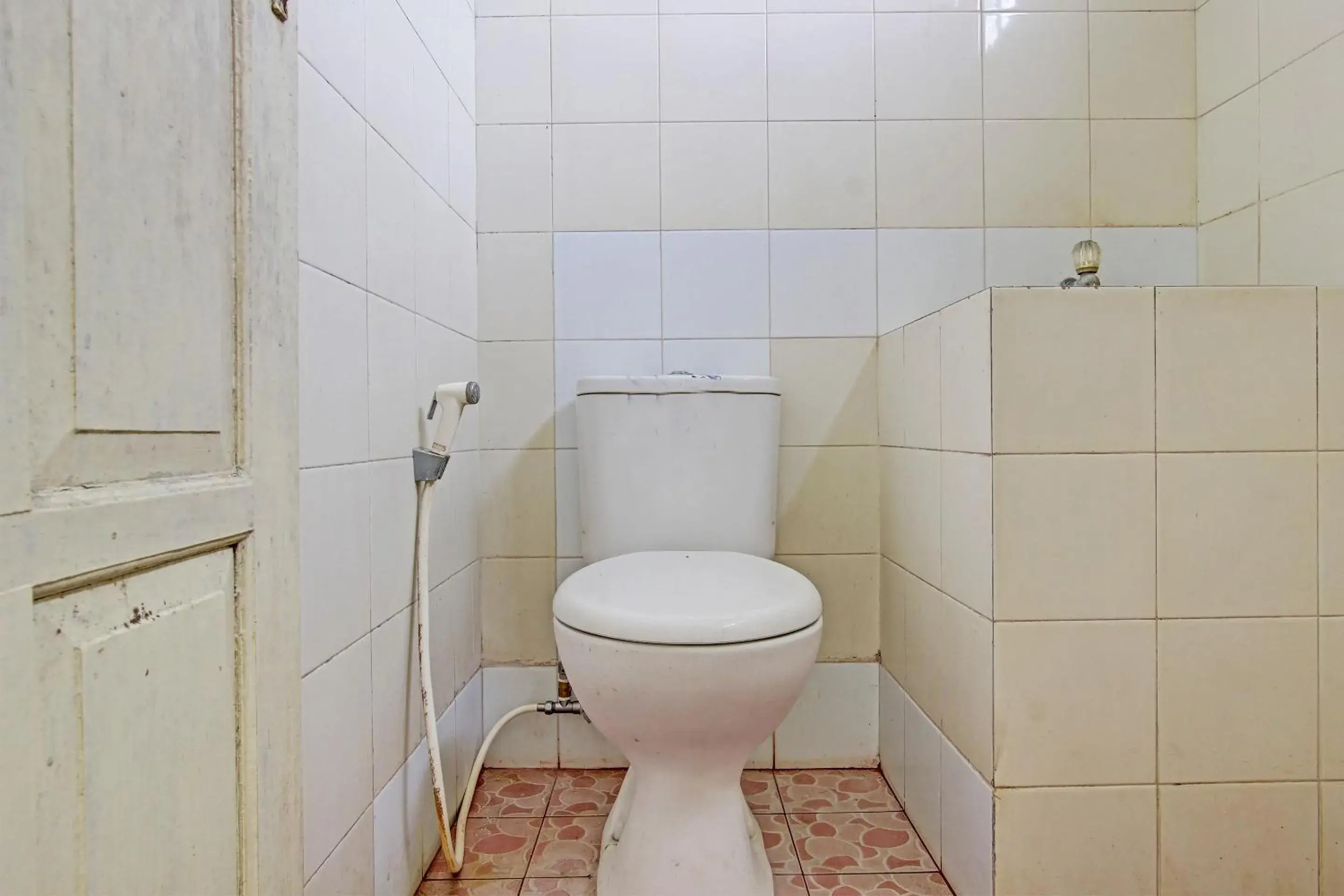 Bathroom in OYO 92884 Agustha Homestay