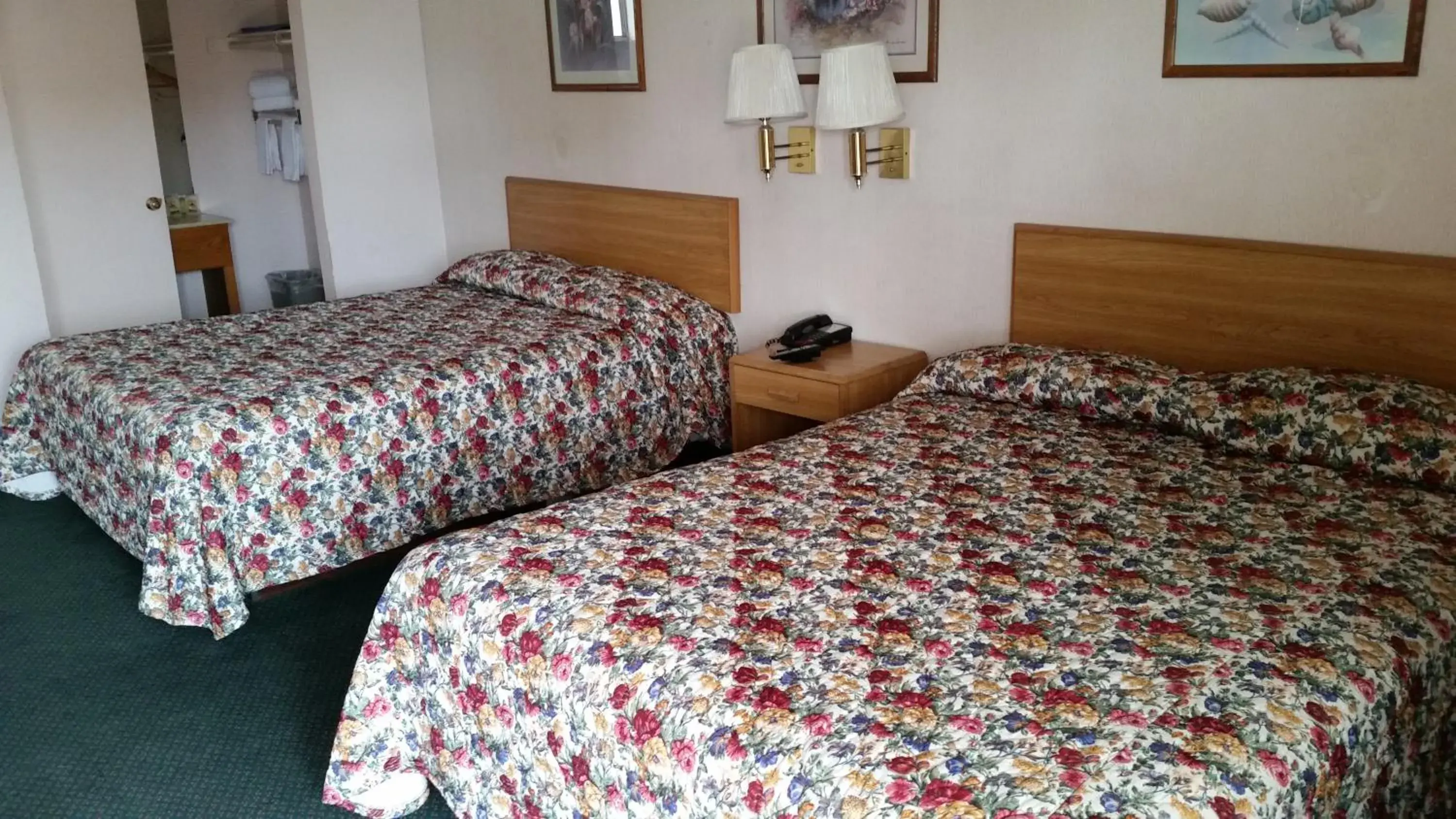 Queen Room with Two Queen Beds - Non-Smoking in Economy Inn Motel Queen Room with Two Queen Beds - Non-Smoking in Economy Inn Motel