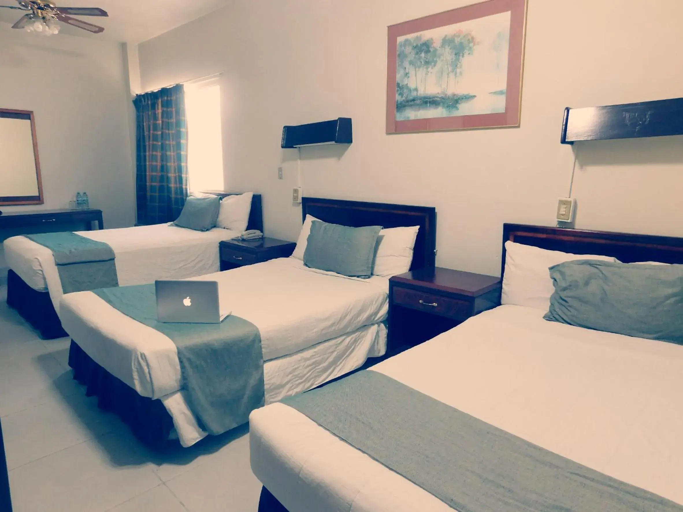 Photo of the whole room, Bed in Hotel Premier Saltillo Coahuila