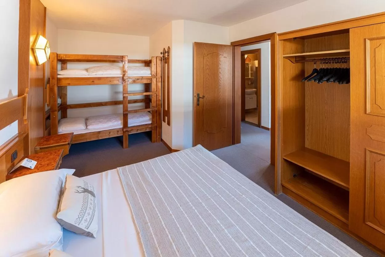 Bed, Bunk Bed in Smy Koflerhof Wellness & Spa Dolomiti