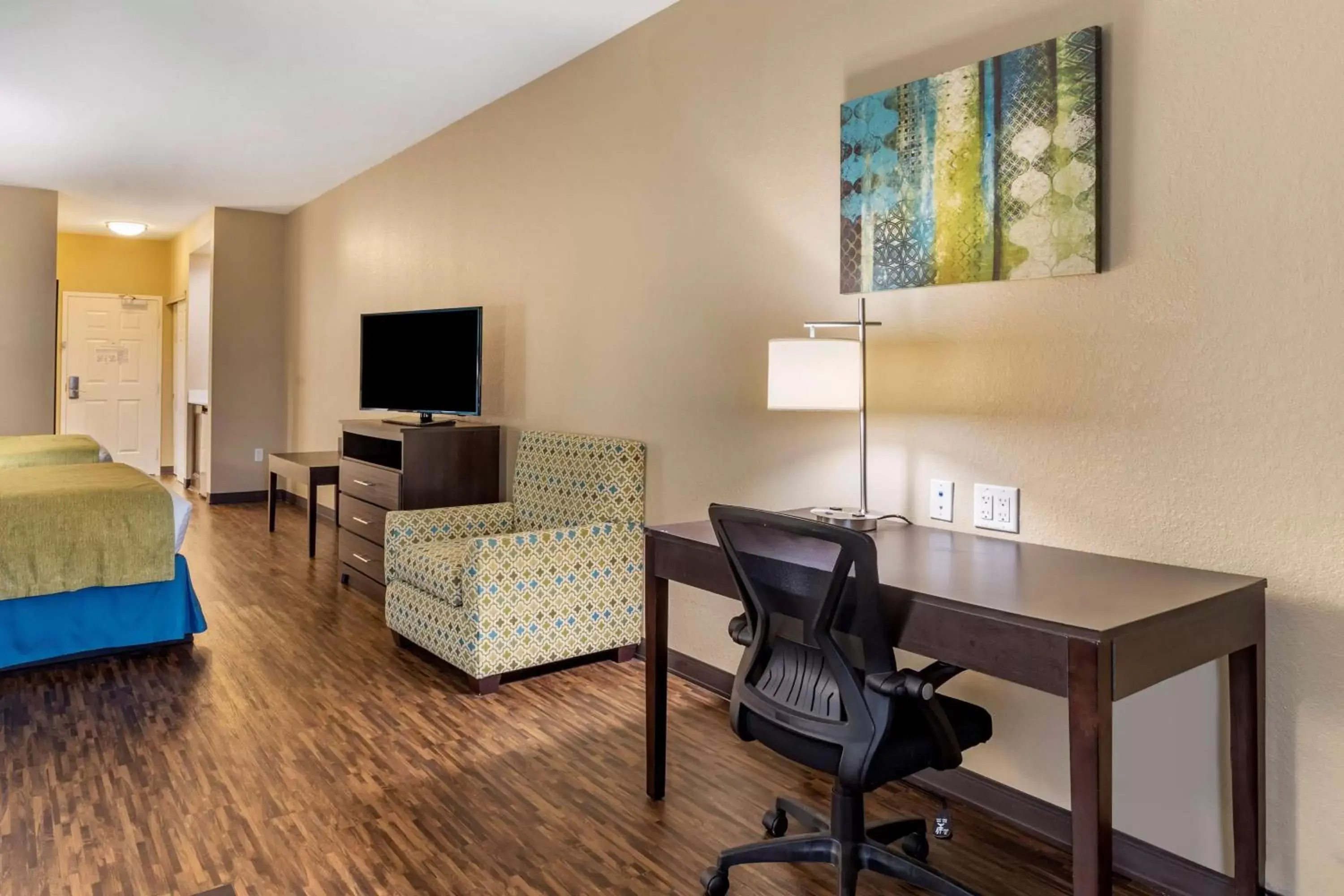 Photo of the whole room, TV/Entertainment Center in Best Western Plus Galveston Suites