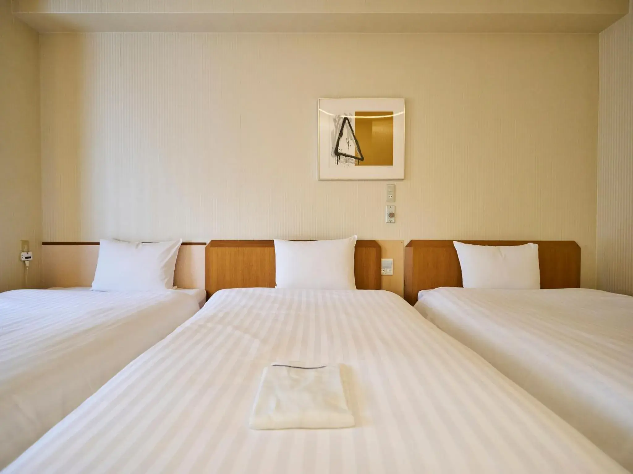 Bed in Court Hotel Fukuoka Tenjin