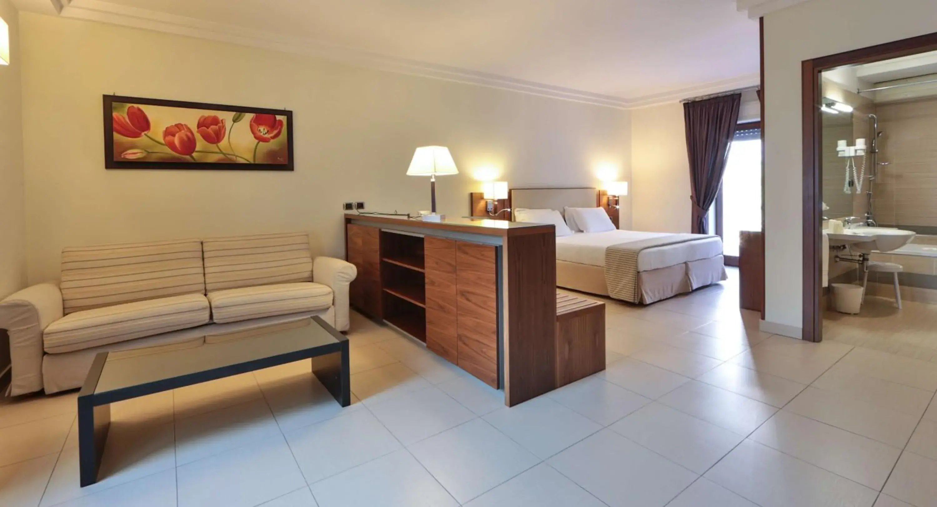 Photo of the whole room, Bed in Suites & Residence Hotel