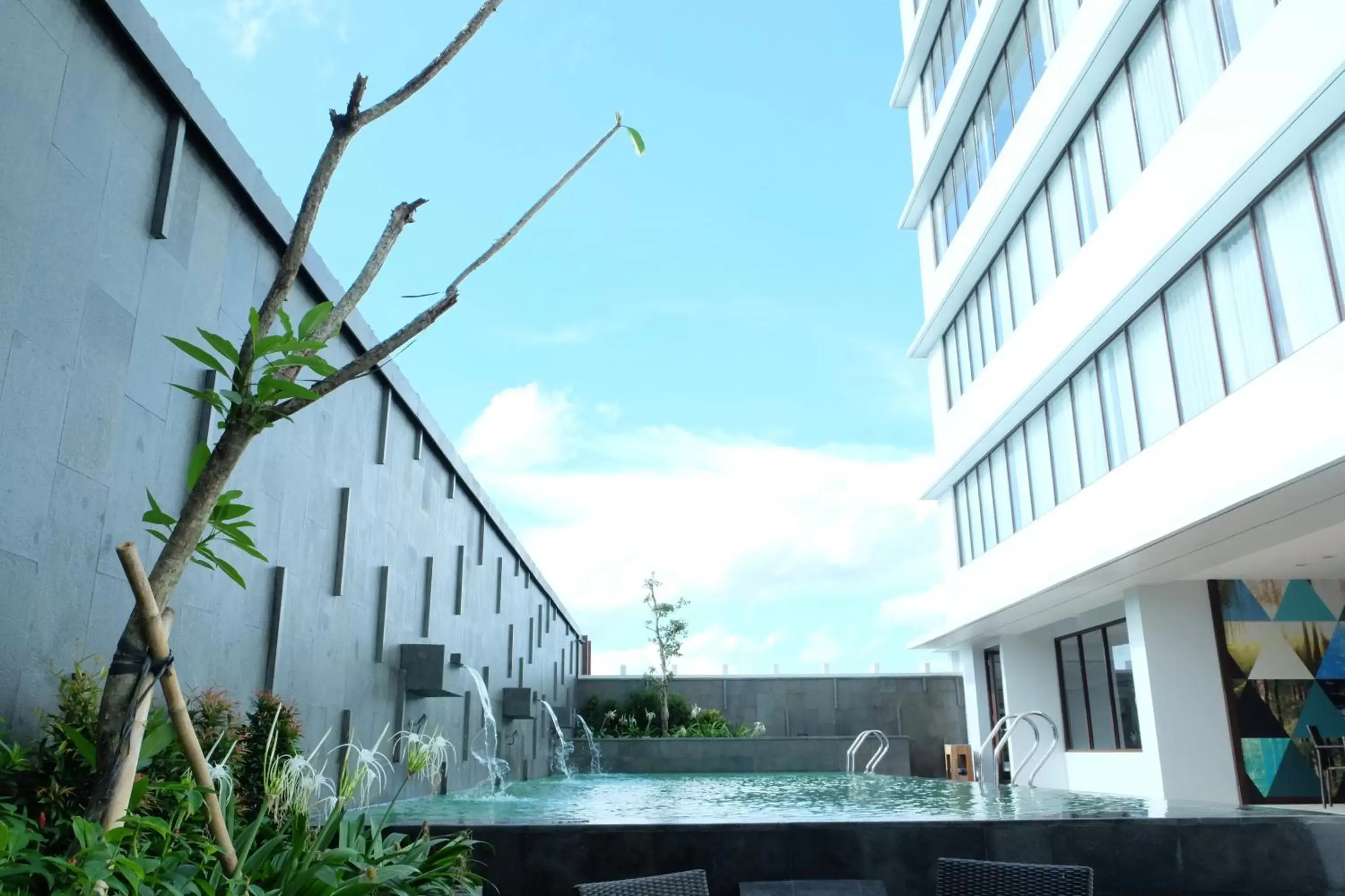Swimming pool, Property Building in Midtown Hotel Samarinda
