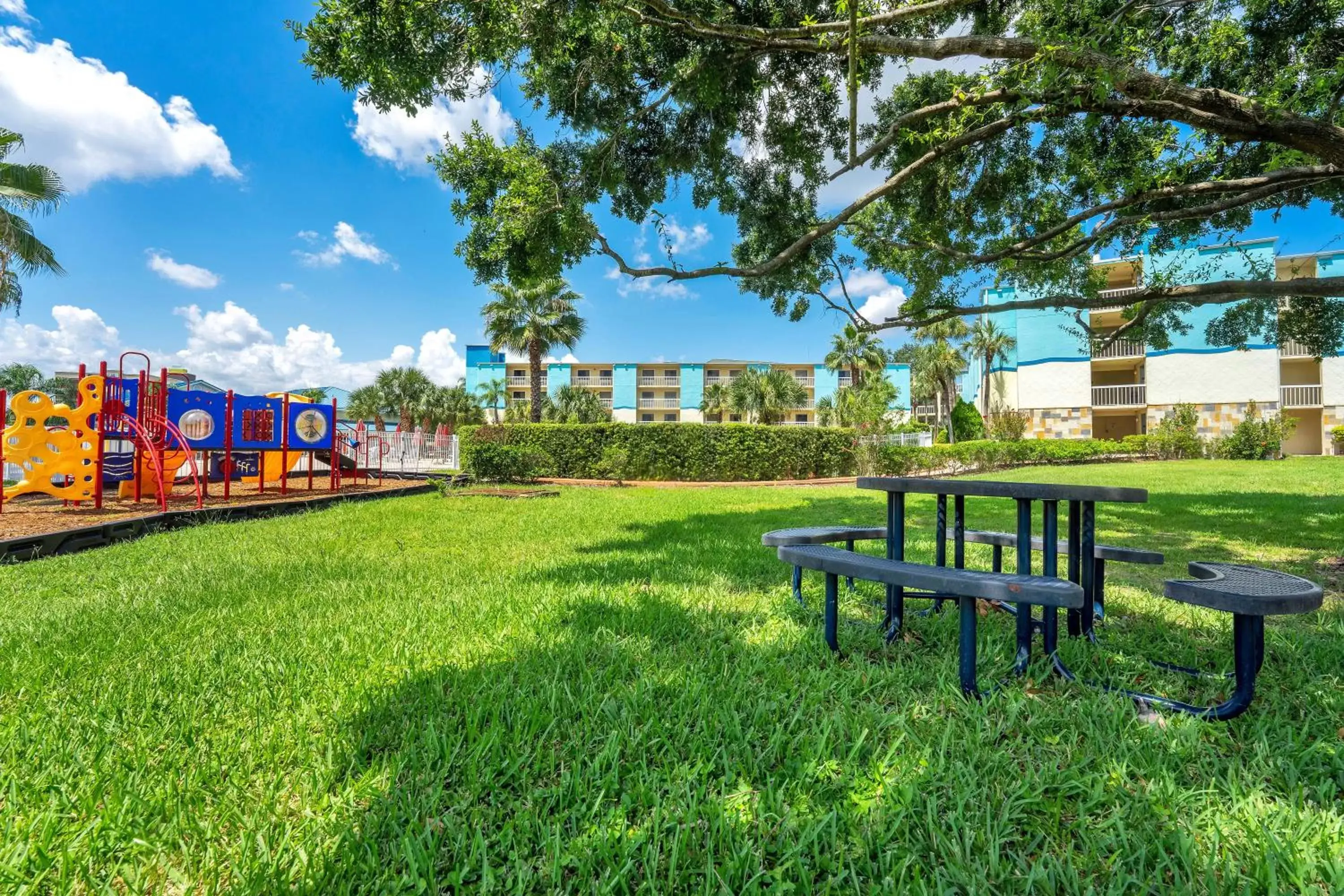 Children play ground, Garden in SureStay Plus by Best Western Orlando International Drive