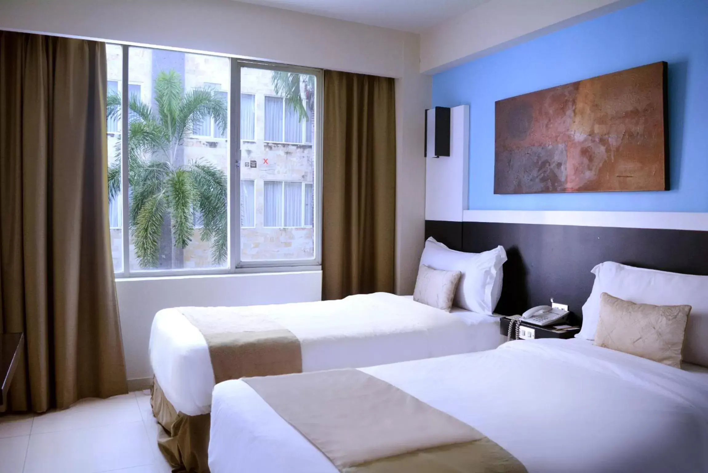 Bedroom in ASTON Denpasar Hotel & Convention