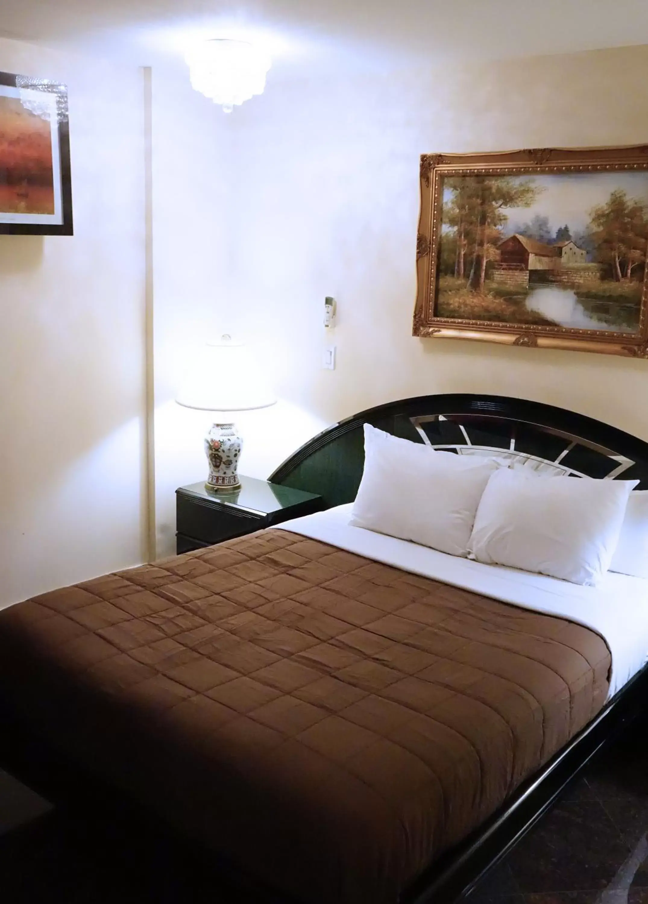 Bed in Paris Suites Hotel