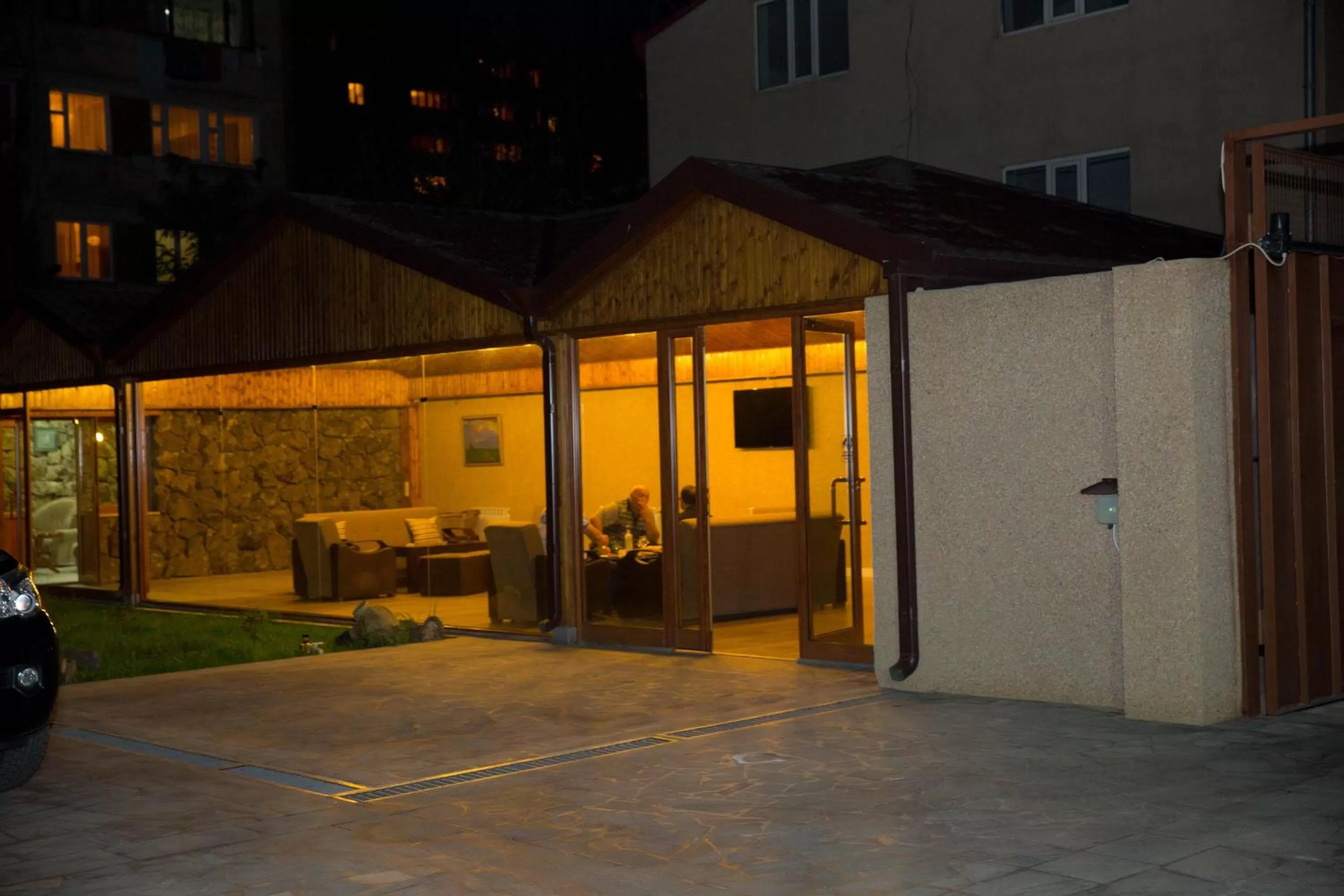 Communal lounge/ TV room, Facade/Entrance in Eridana Hotel