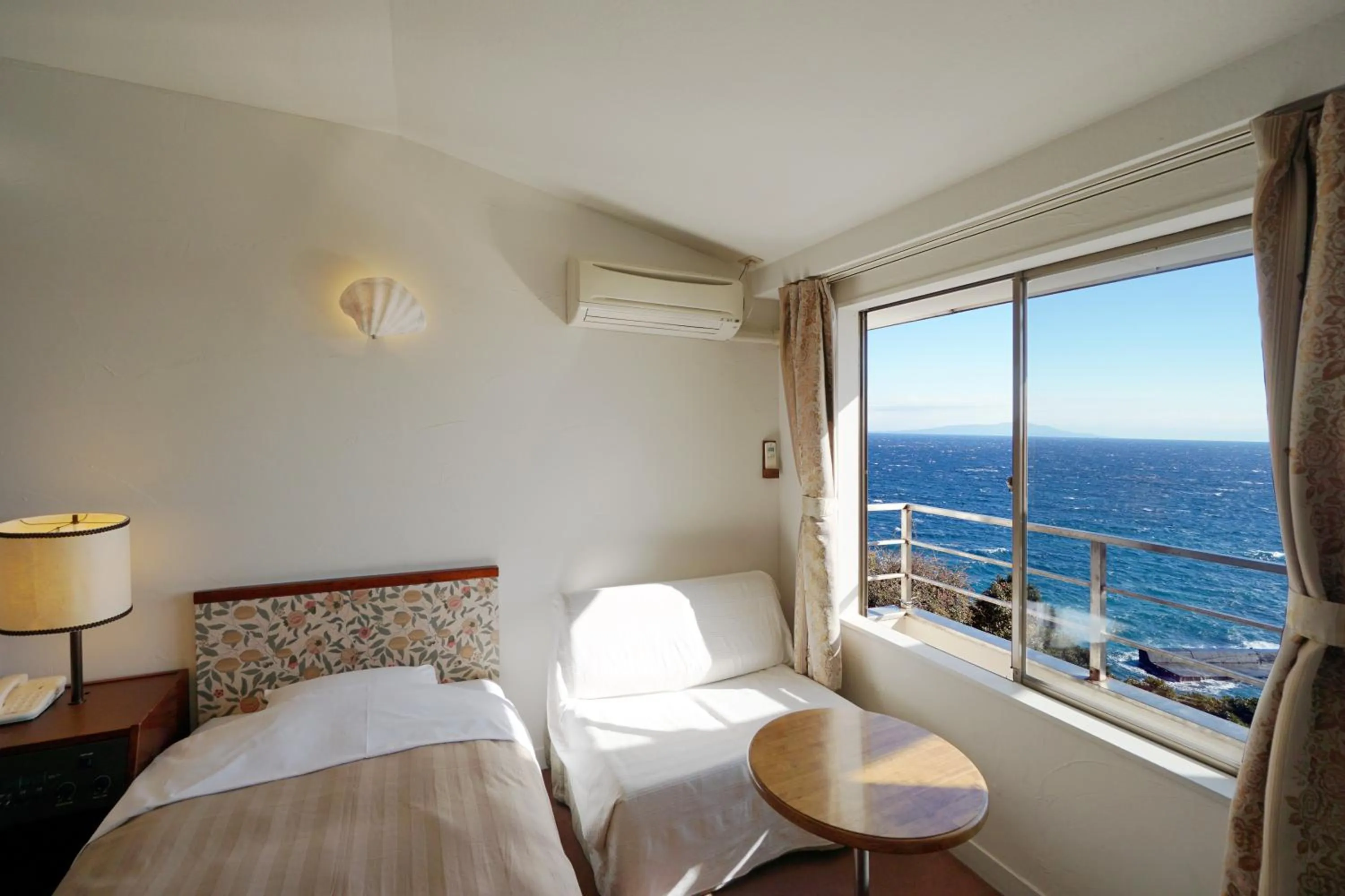 Bed in Gardenvilla Shirahama