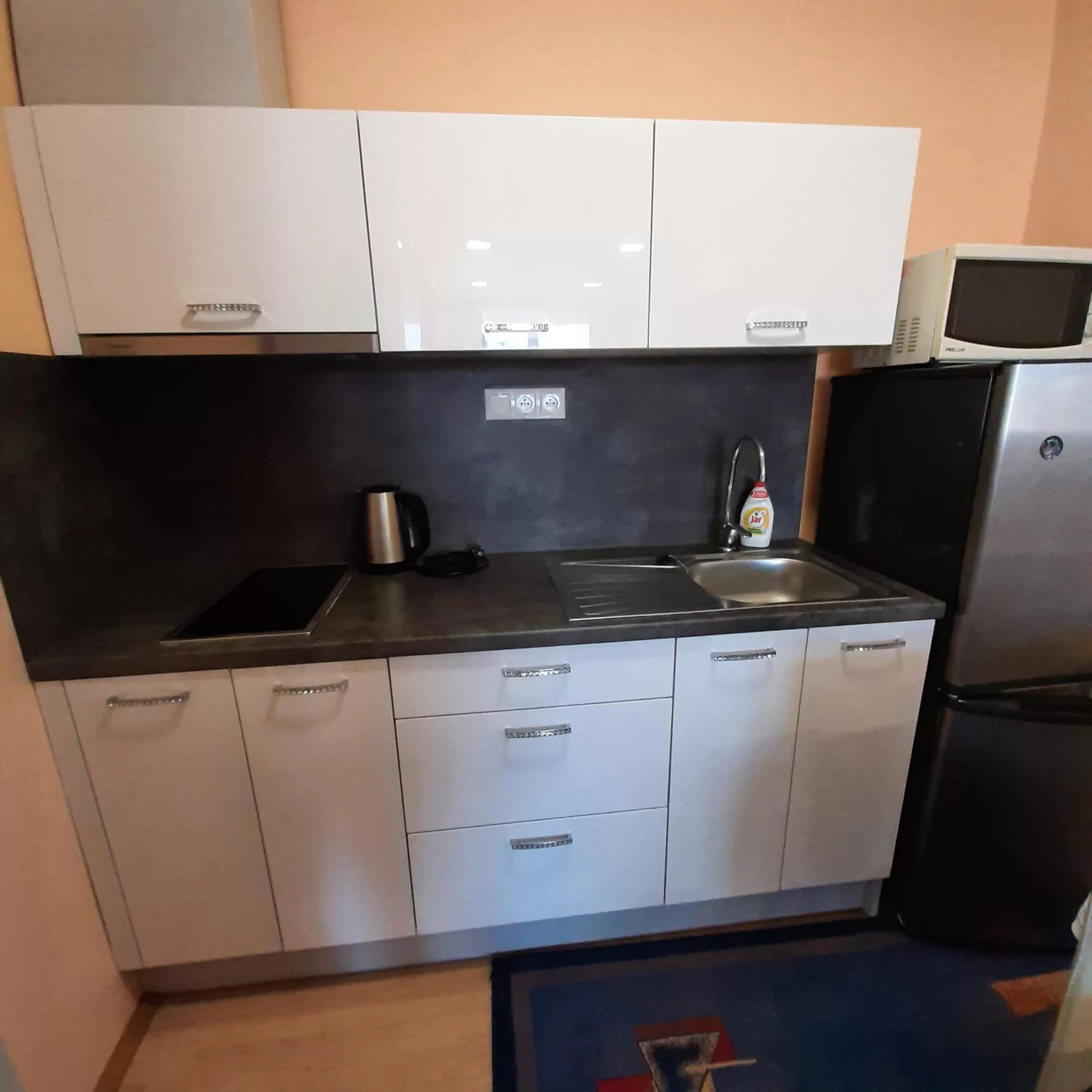 Kitchen or kitchenette in garni Hotel S.O.G.* * *