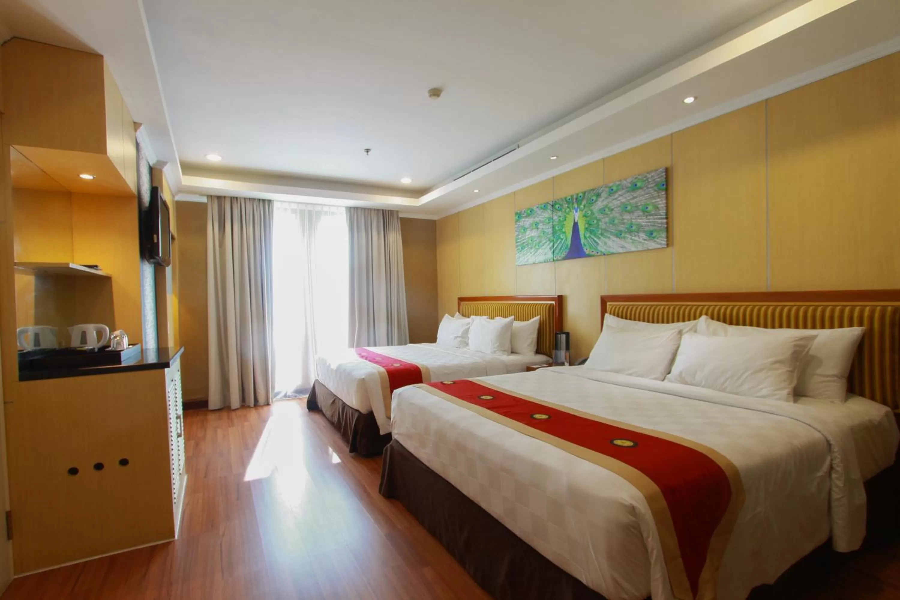 Photo of the whole room, Bed in Swiss-Belhotel Maleosan Manado