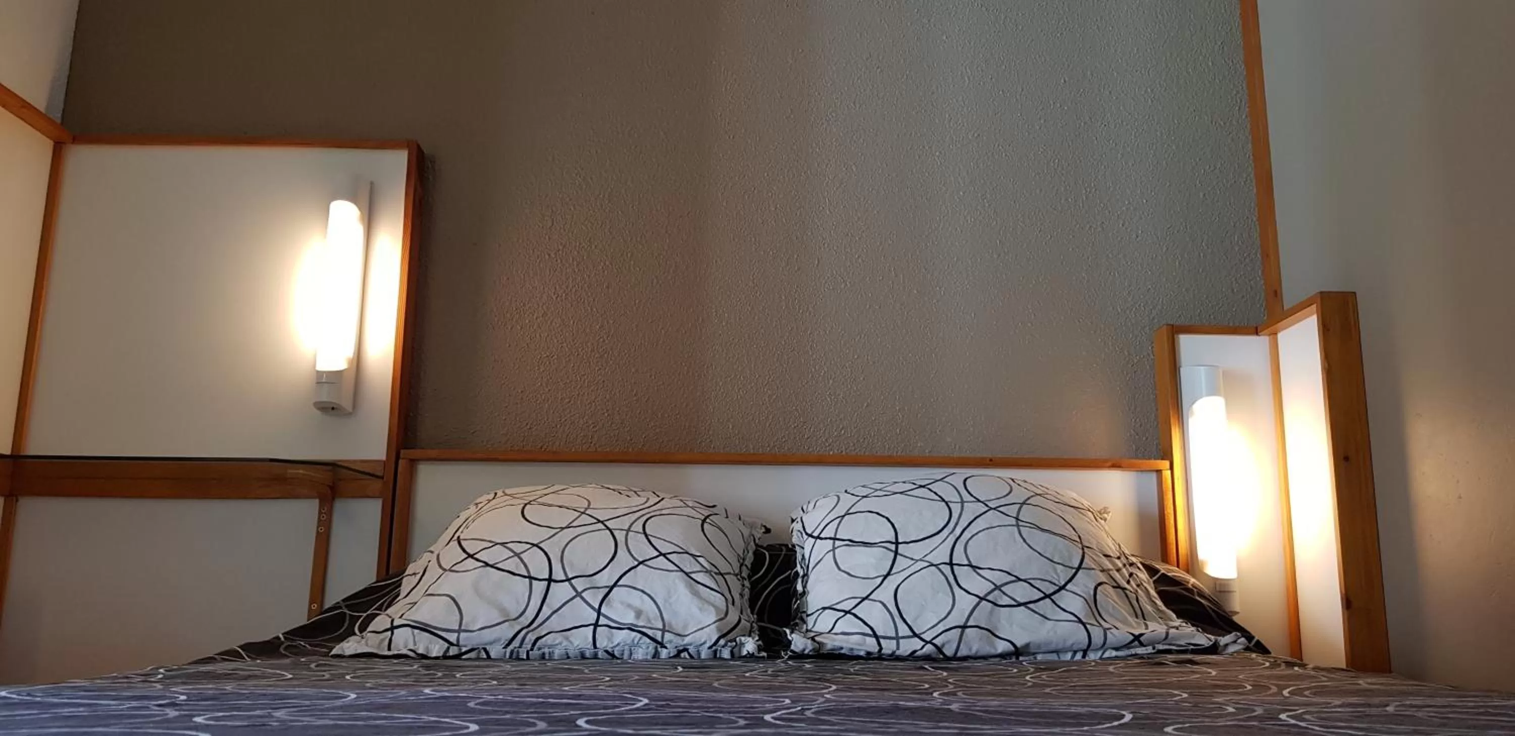 Bed in Hôtel Eco Logis Espace Bellevue