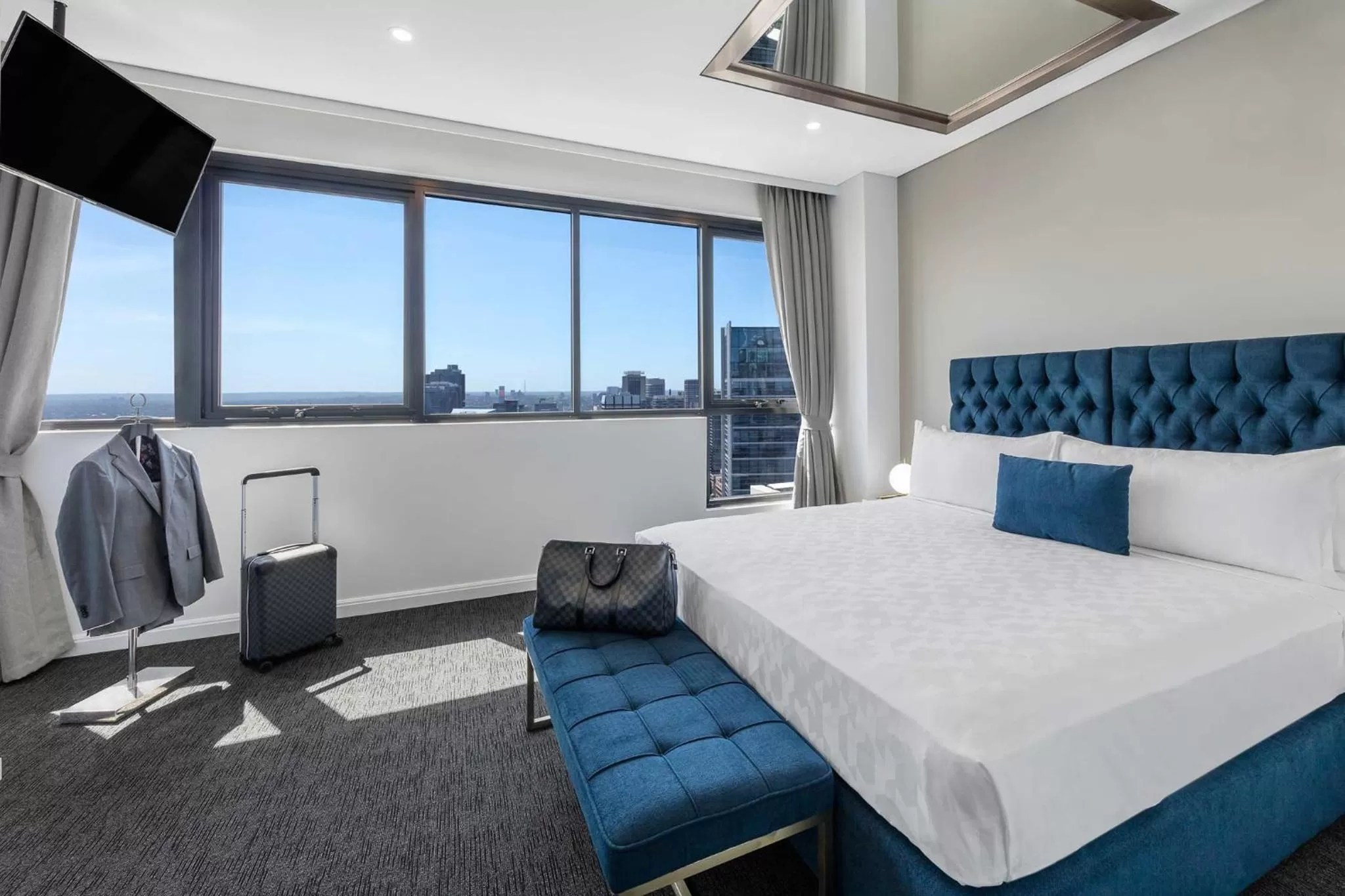 Bed in Meriton Suites Kent Street, Sydney