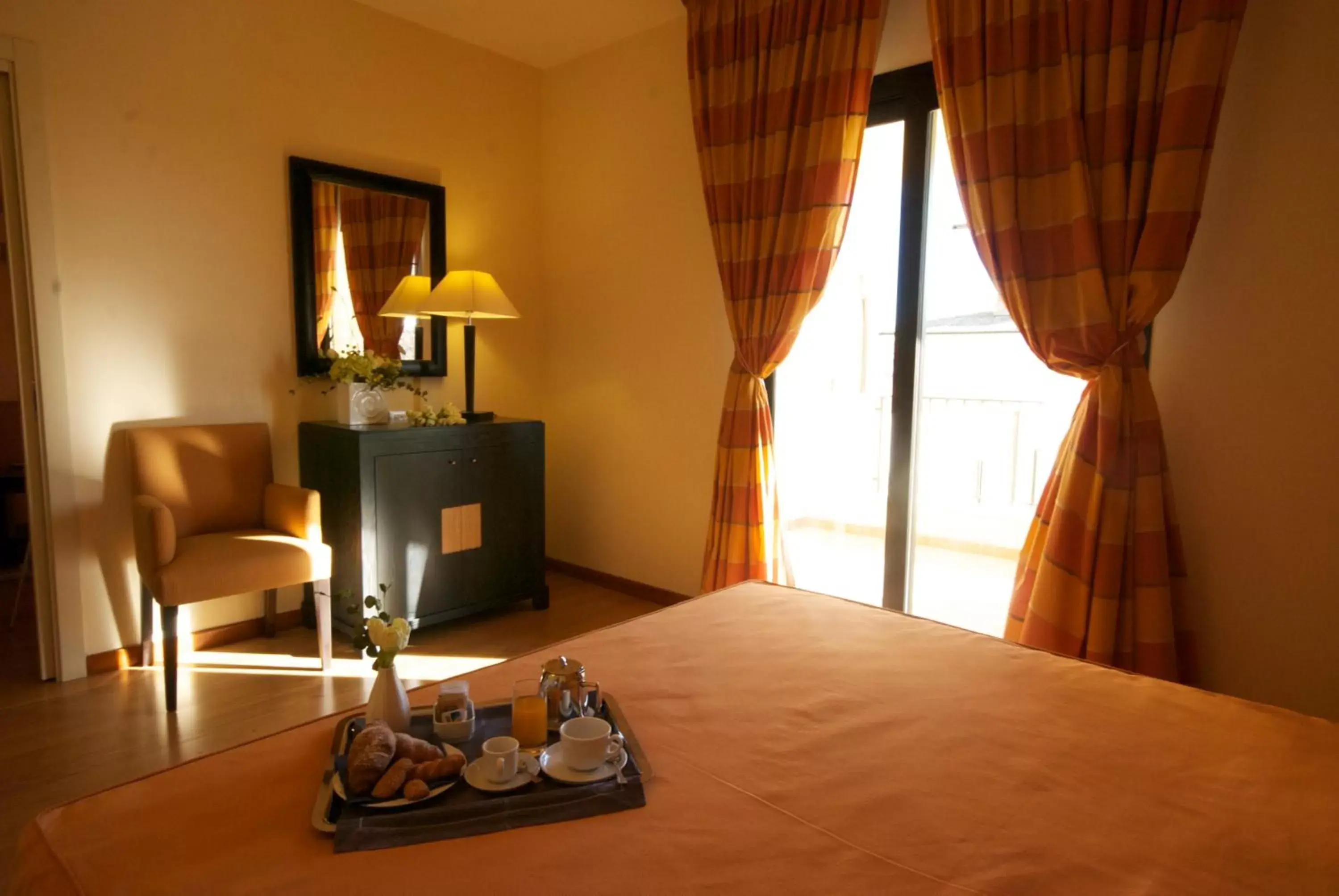Bed in Mahara Hotel & Wellness