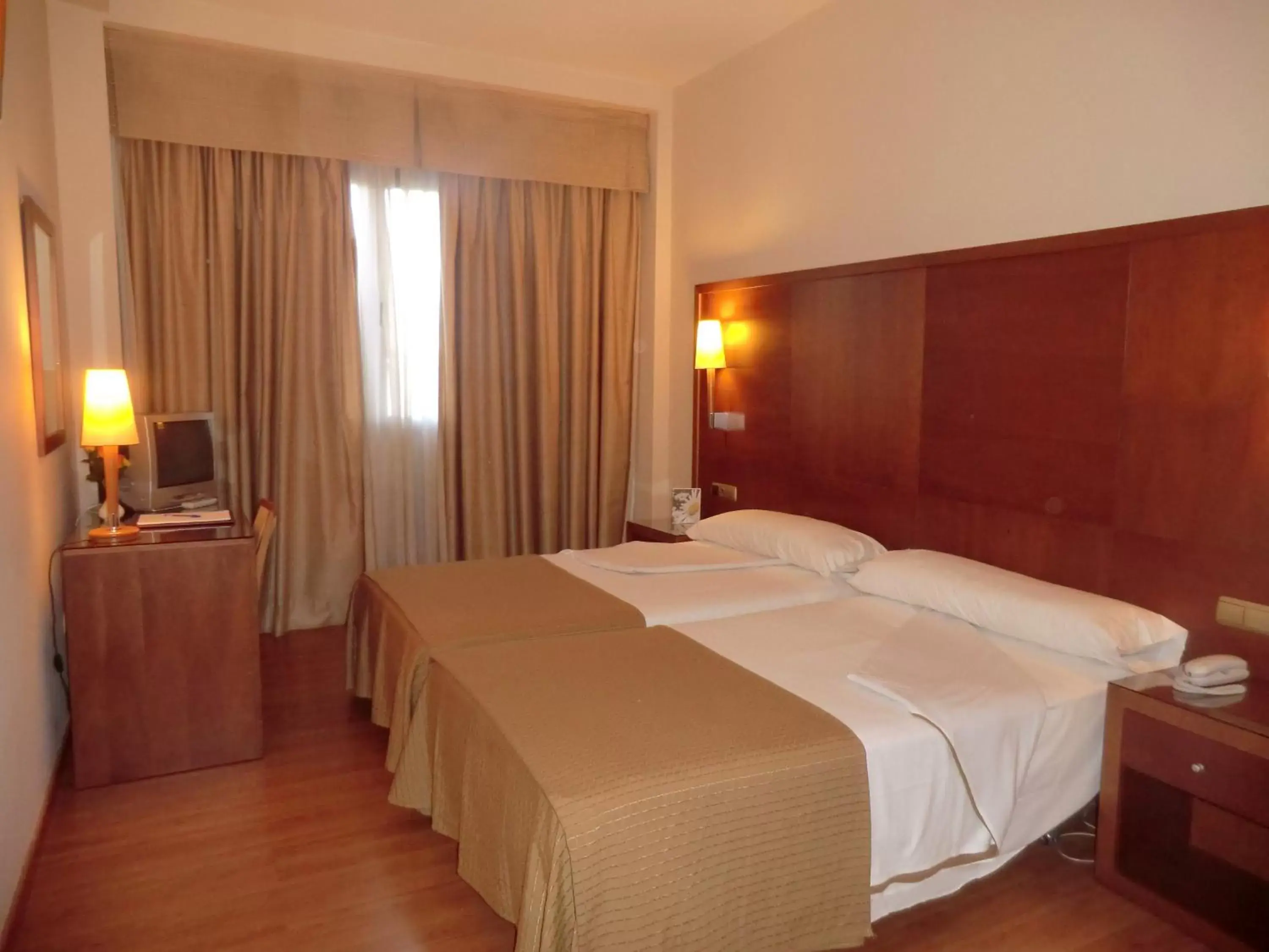 Bed in Hotel Saylu
